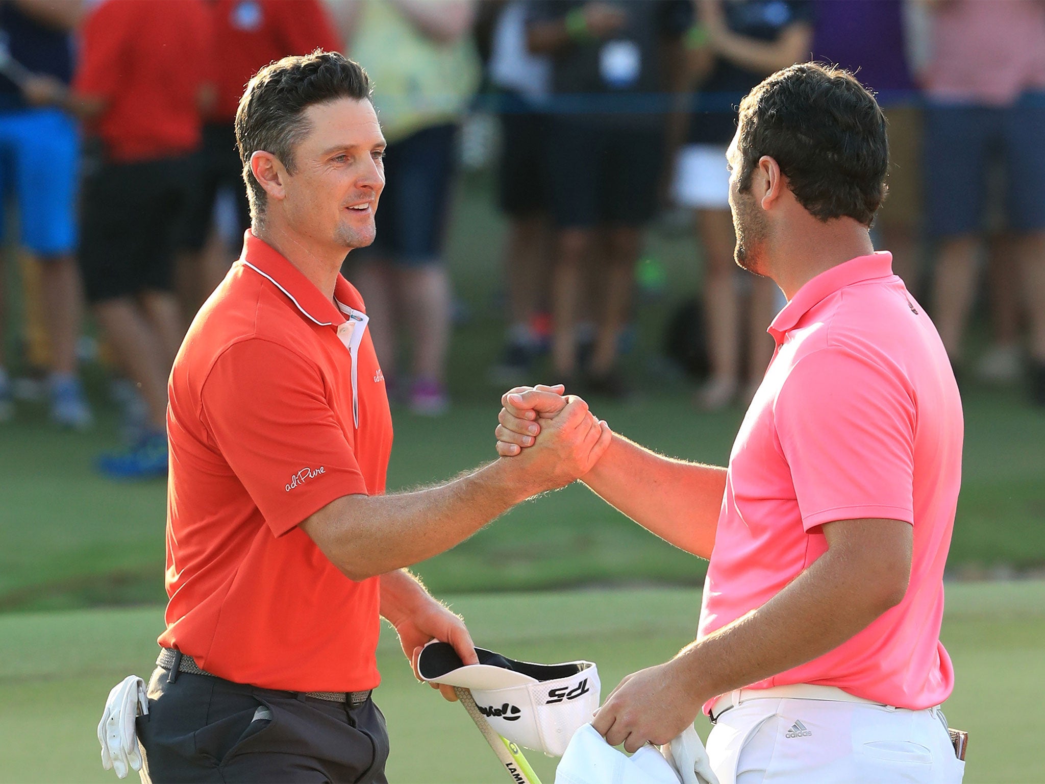 Justin Rose (left) could be on course for a remarkable double victory