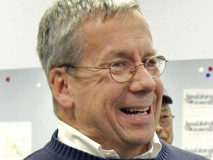 William O'Neill, an Ohio appeals court judge, laughs during a campaign stop in Mentor, Ohio