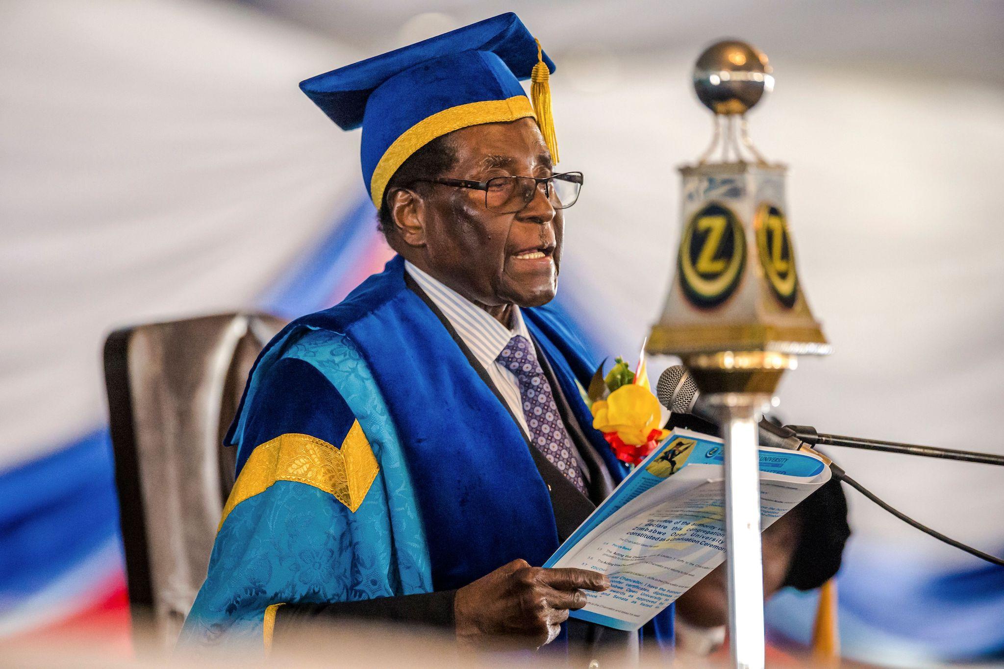 Zimbabwe's President Robert Mugabe delivers a speech during a graduation ceremony at the Zimbabwe Open University in Harare, where he presides as the Chancellor on November 17, 2017