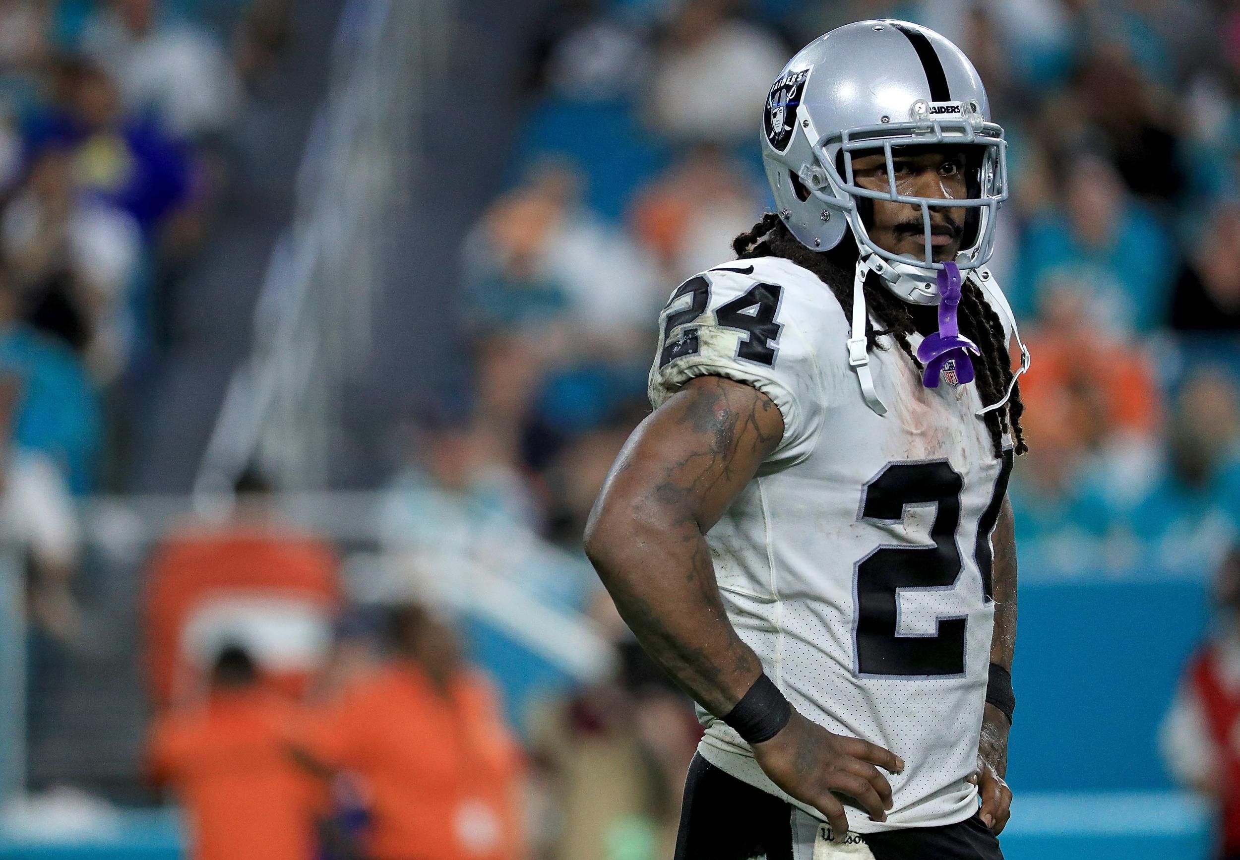 Marshawn Lynch of the Oakland Raiders looks on during a game against the Miami Dolphins at Hard Rock Stadium