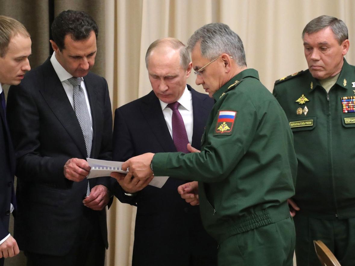 &#13;
Mr Assad and Mr Putin study military plans in Sochi &#13;