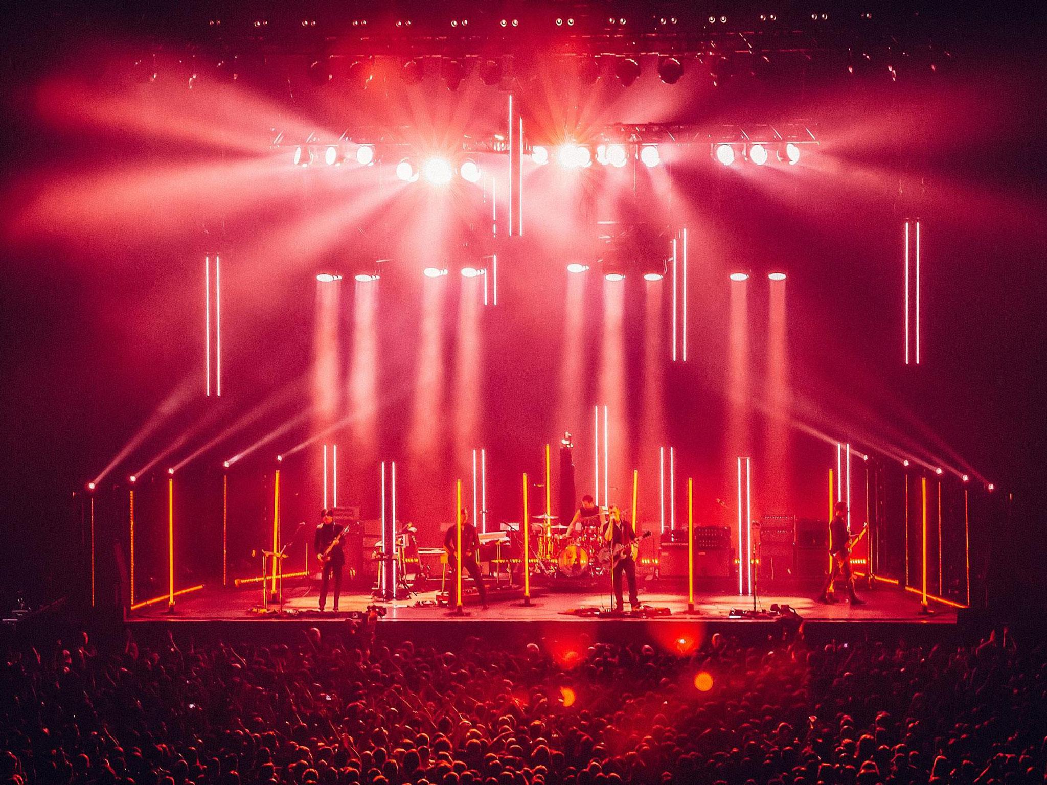 Queens of the Stone Age performing at London's O2 Arena