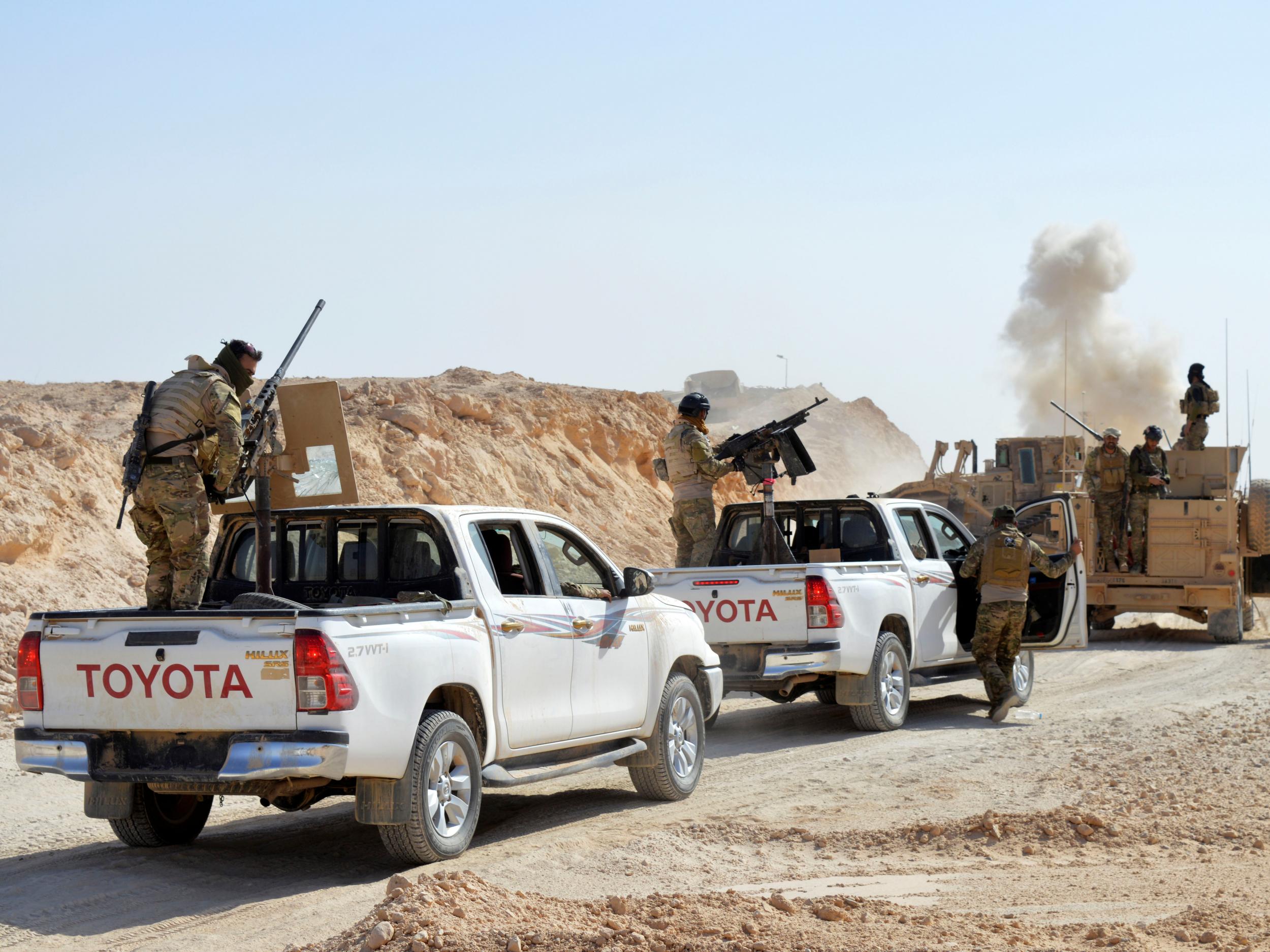 Iraqi forces vehicles after the capture of Rawa, the last remaining Iraqi town under Isis control