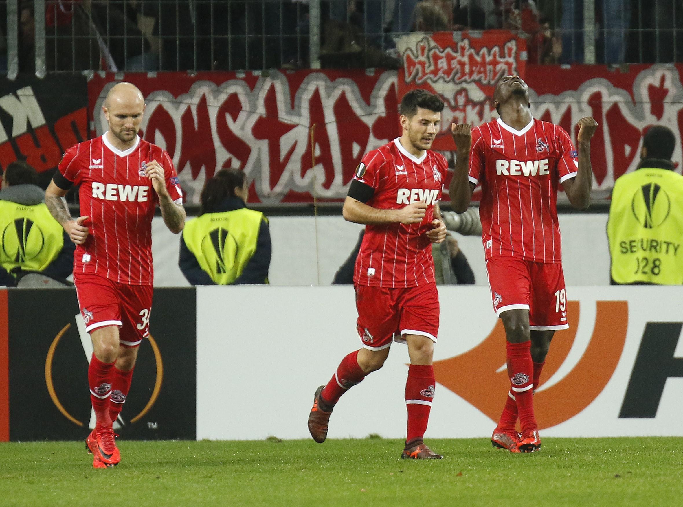 Sehrou Guirassy, right, and team-mates celebrate after scoring