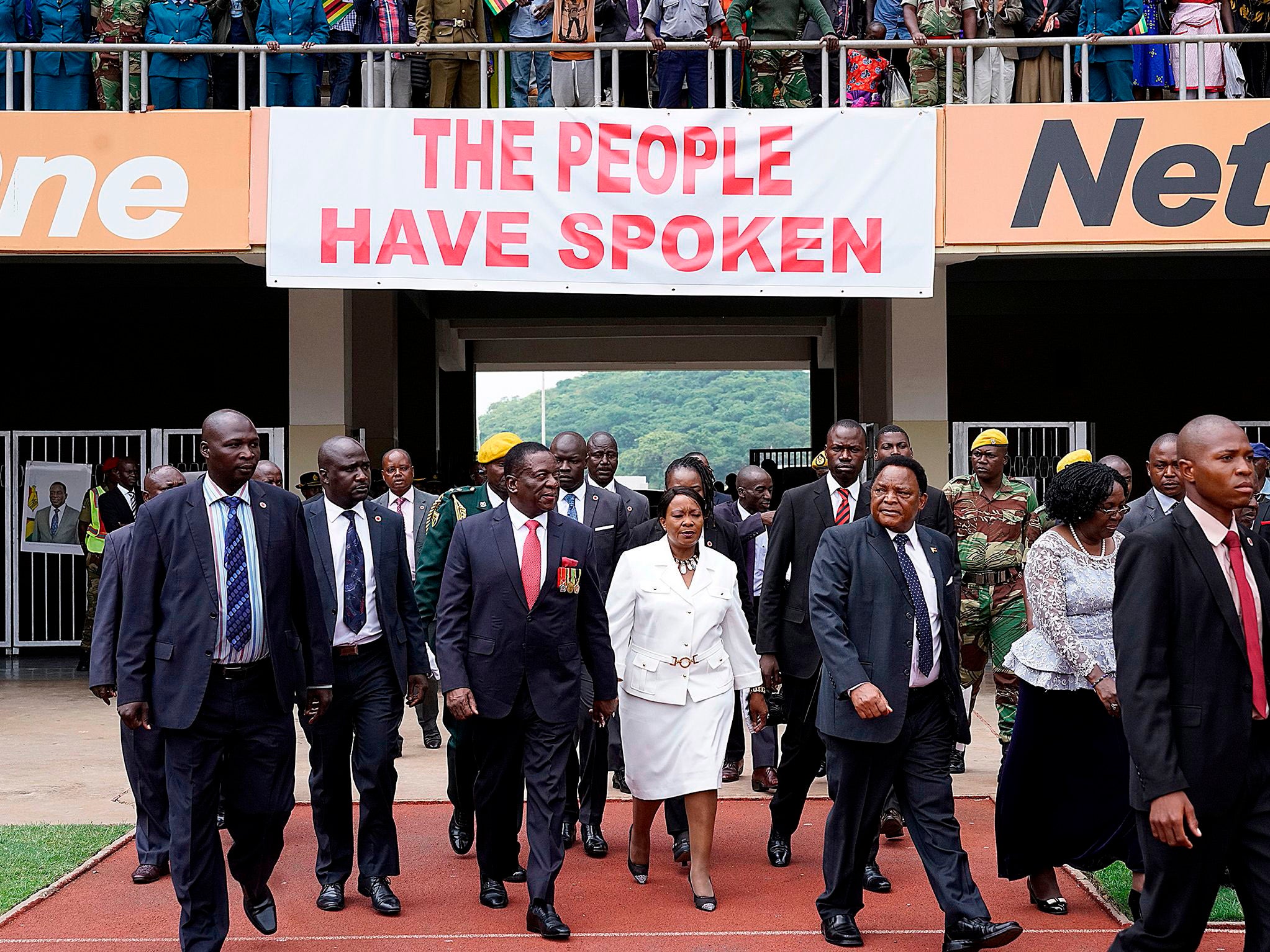 Emmerson Mnangagwa and his wife Auxillia arrive at the presidential inauguration ceremony in the capital Harare