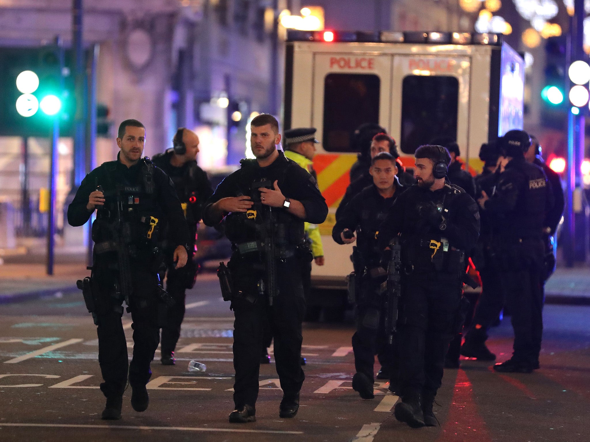 Armed police patrol along Oxford street following an incident in central London