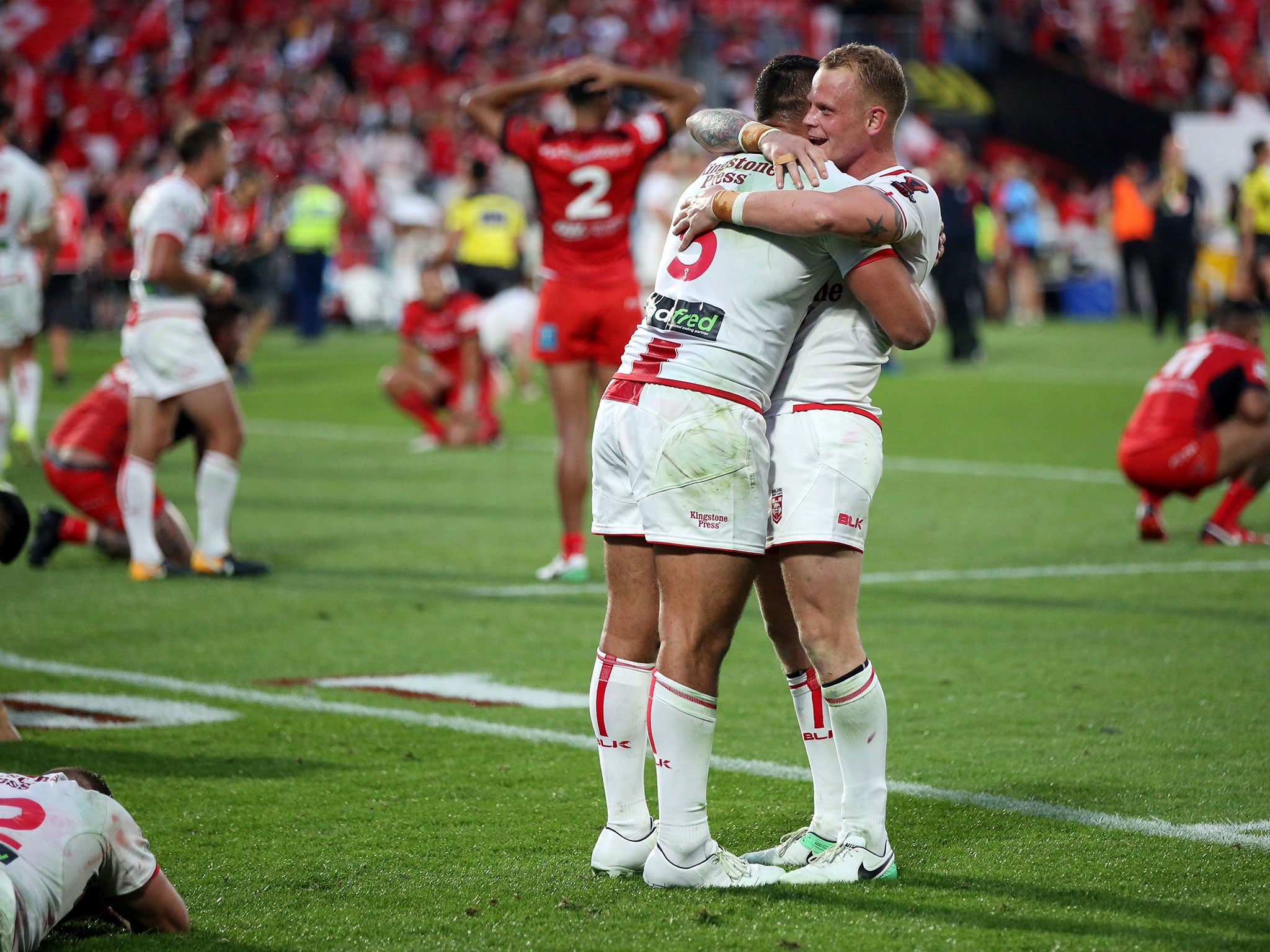 Ryan Hall (L) and Kevin Brown celebrate after the final whistle in Auckland