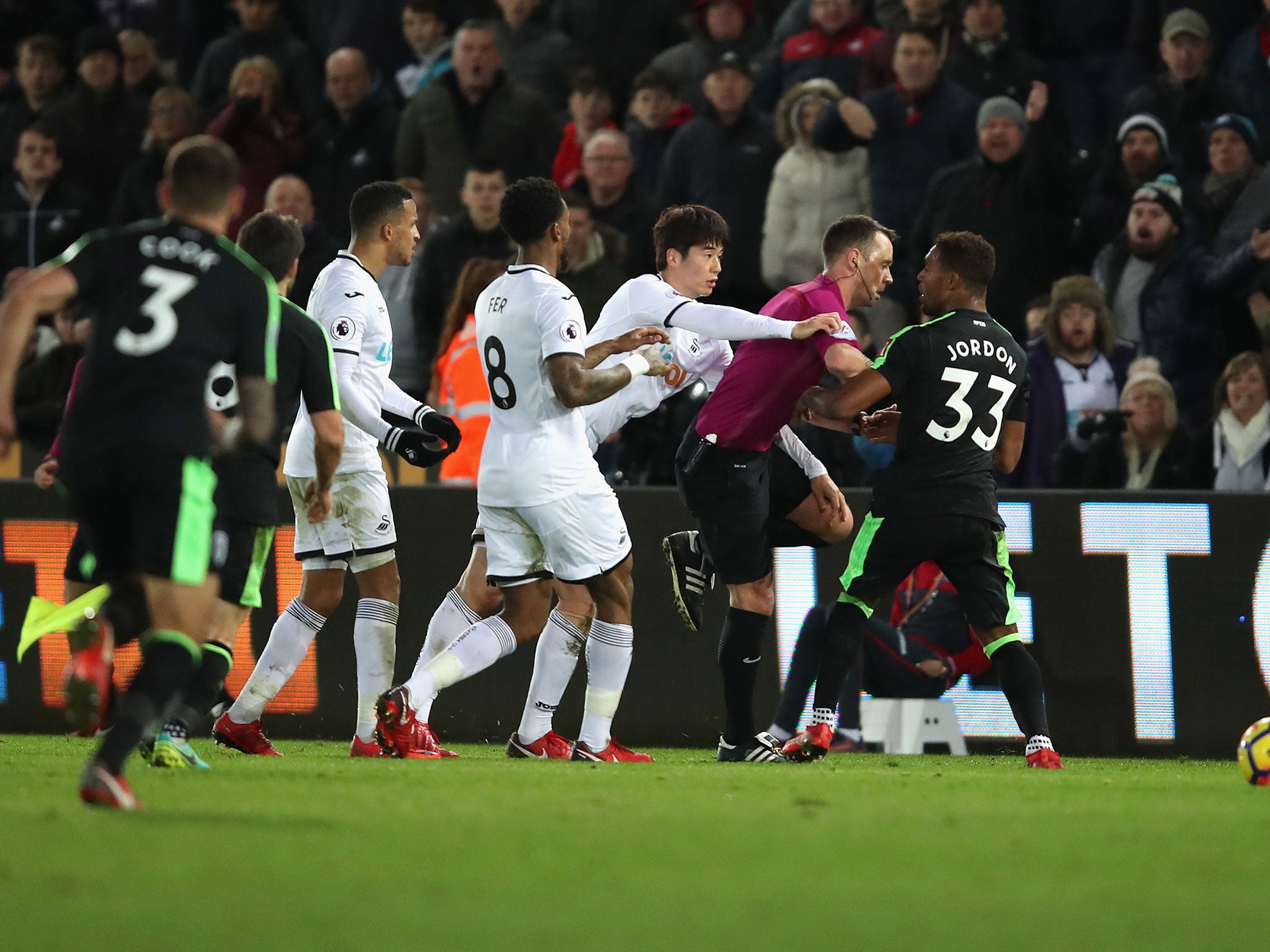 Tensions rang high in the clash at the Liberty Stadium