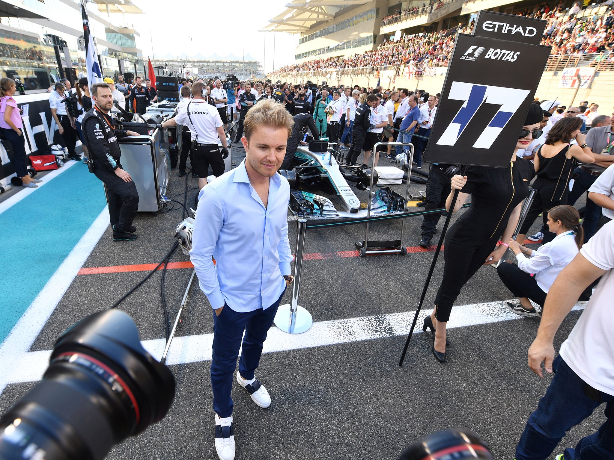 2016 F1 world champion Nico Rosberg stands in front of his old car