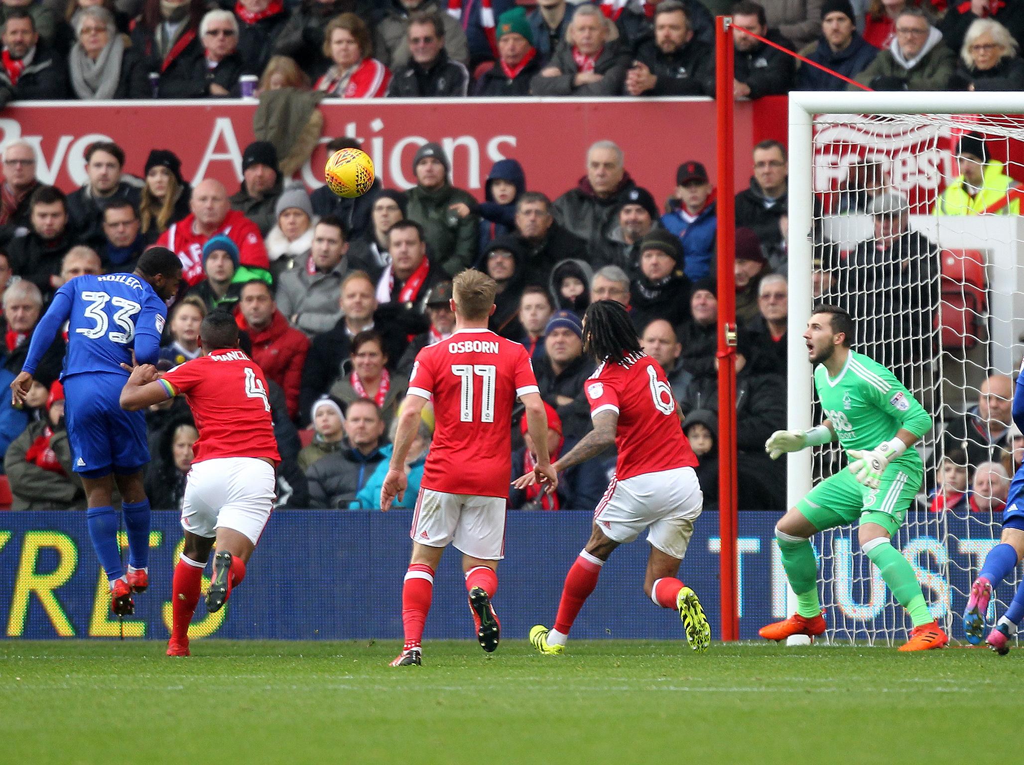 Junior Hoilett leaps highest to head Cardiff in front