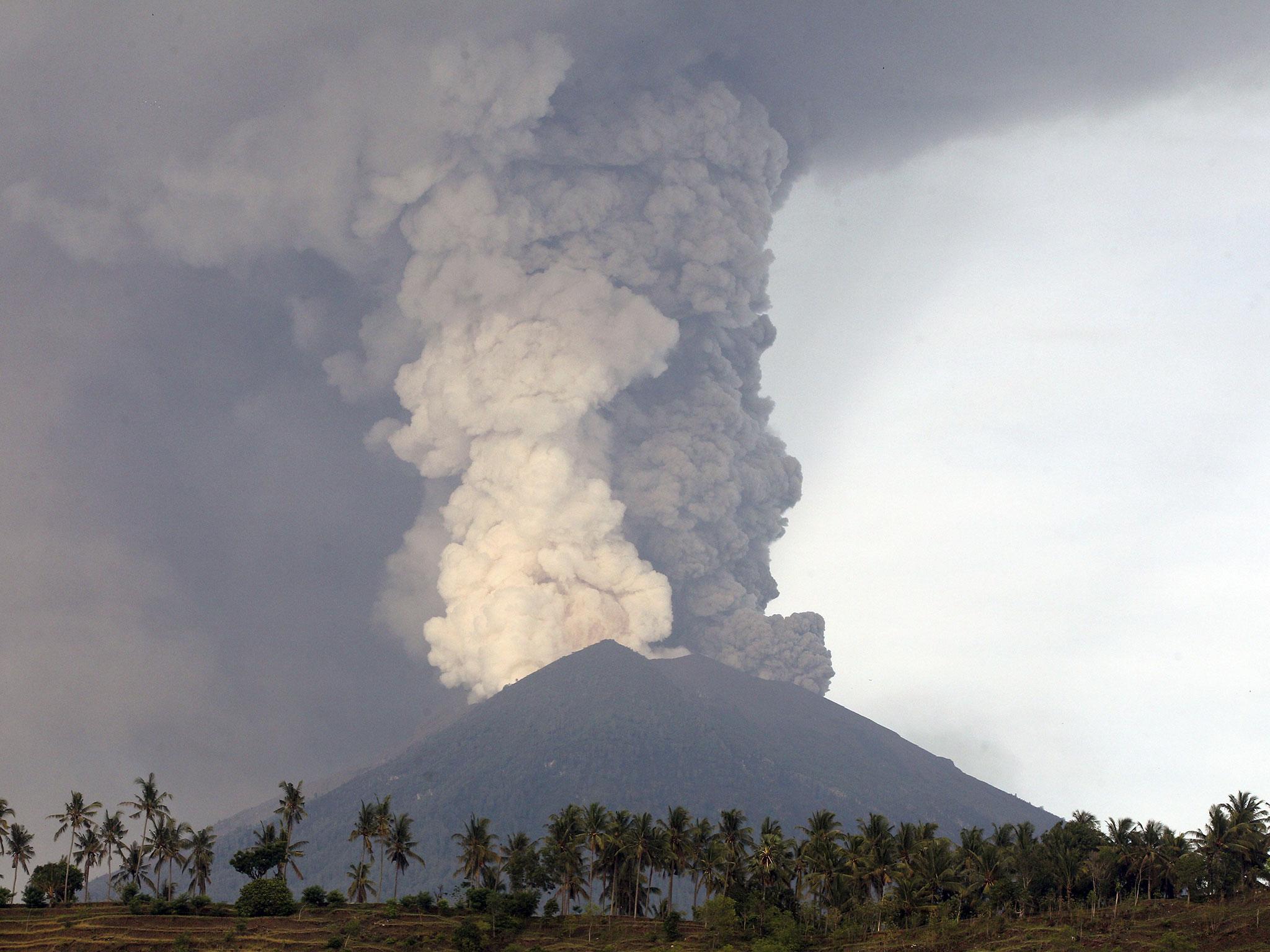 A view of the Mount Agung volcano erupting in Karangasem, Bali, Indonesia