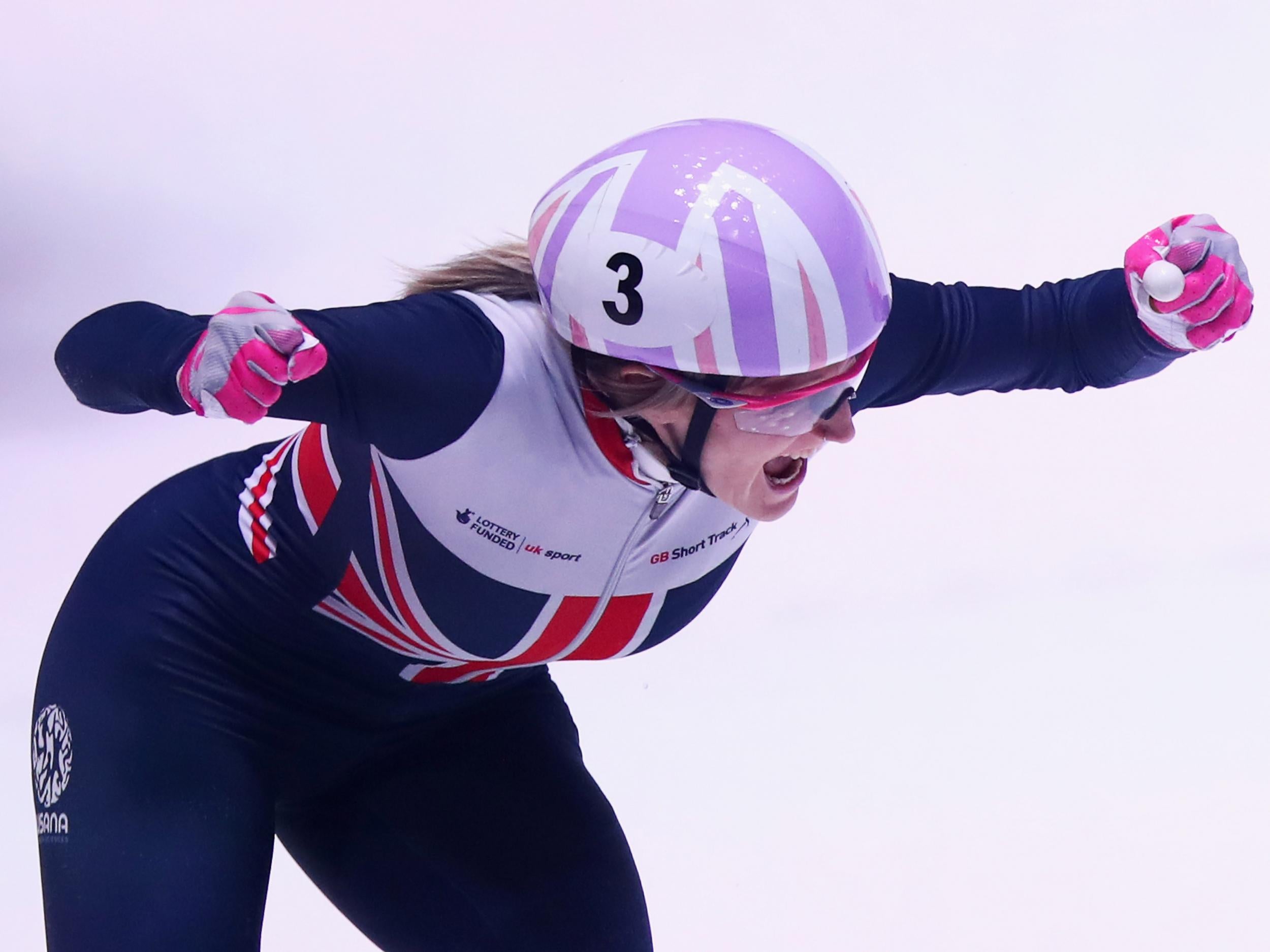 Elise Christie celebrates after her victory in Rotterdam