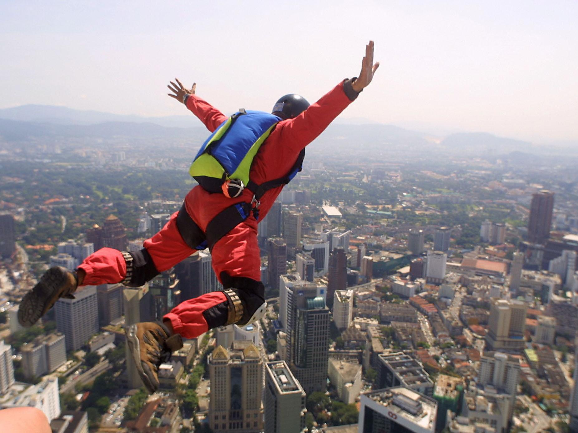 Skydiver jumps from the top of the Kuala Lumpur Tower