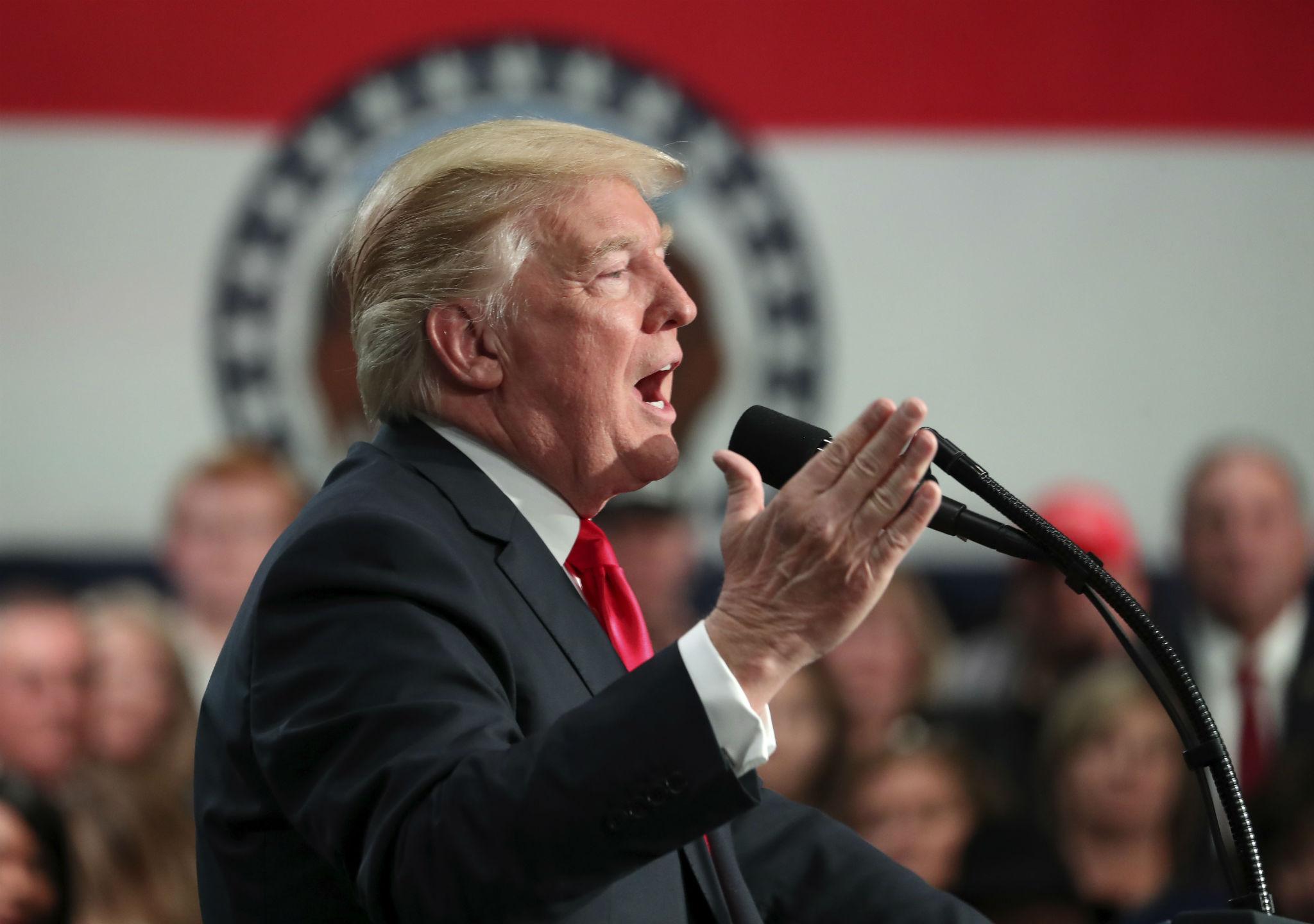 President Donald Trump speaks about tax reform at the St. Charles Convention Center, Wednesday, Nov. 29, 2017, in St. Charles, Missouri. (AP Photo/Andrew Harnik)