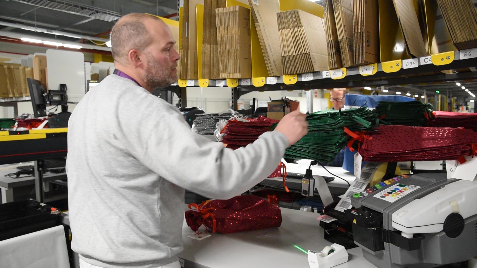 Festive orders also involve a touch of gift wrapping for Amazon’s Christmas staff