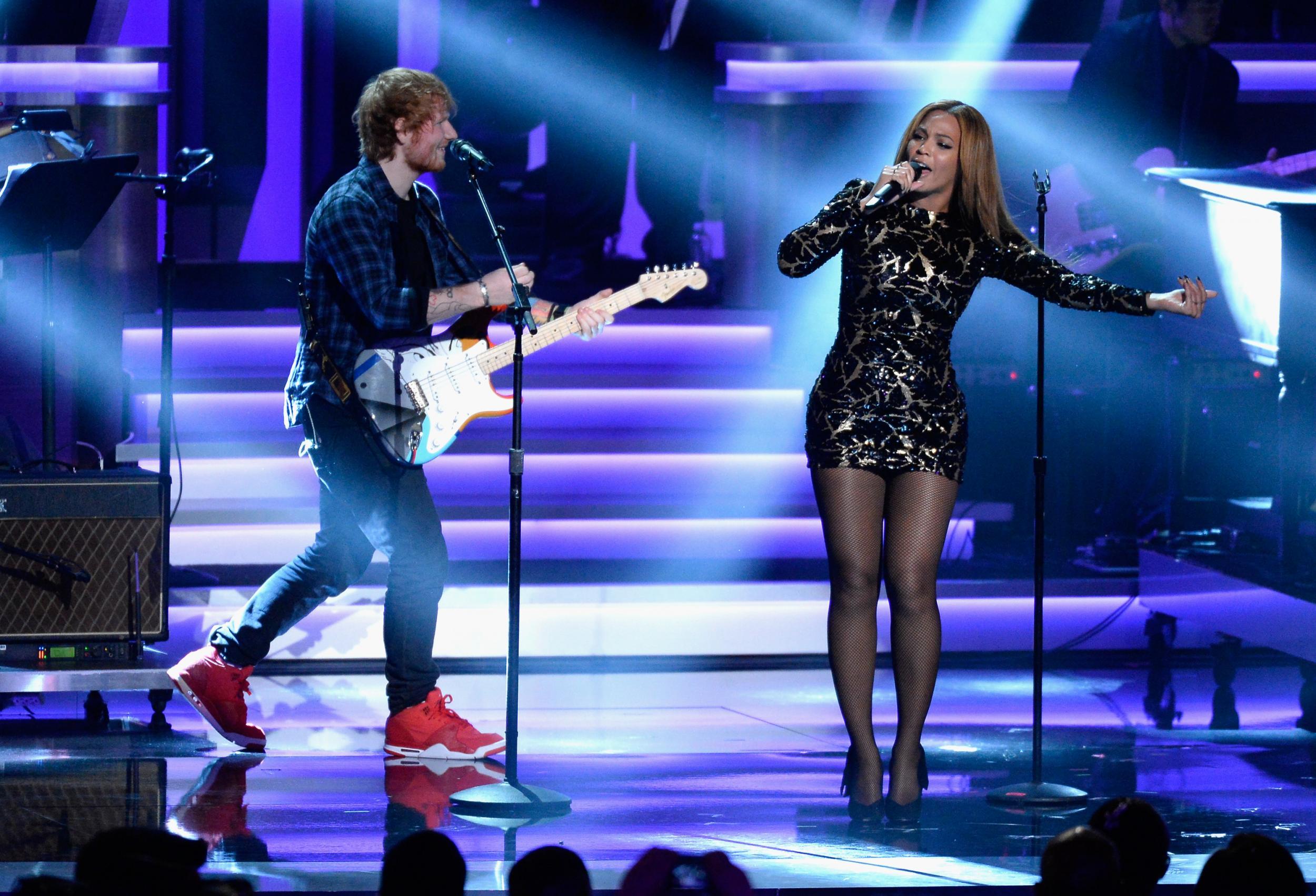 Ed Sheeran performs with Beyonce at a Stevie Wonder tribute at the Grammys in 2015