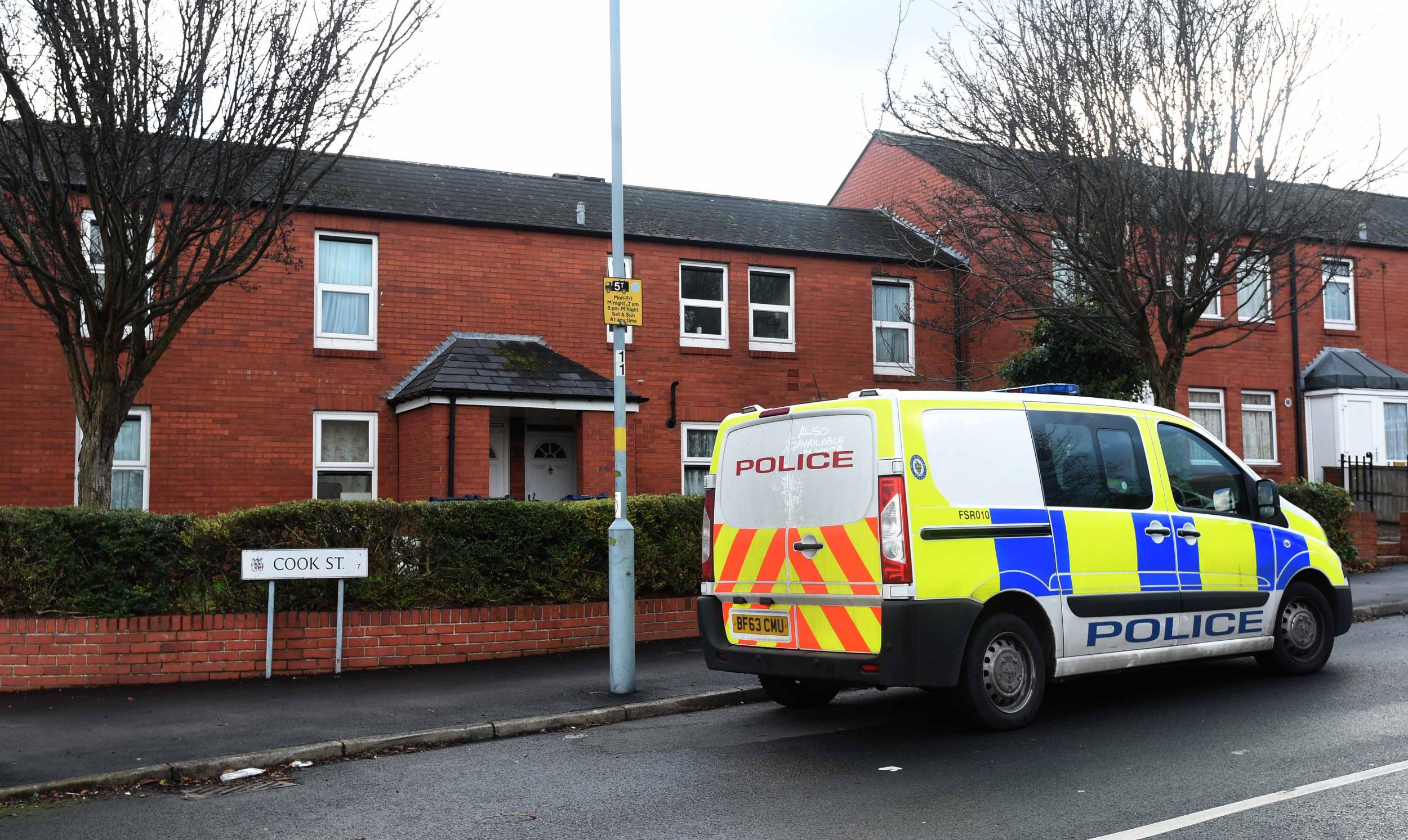 Two people have been arrested after a seven-year-old was found dead outside his home