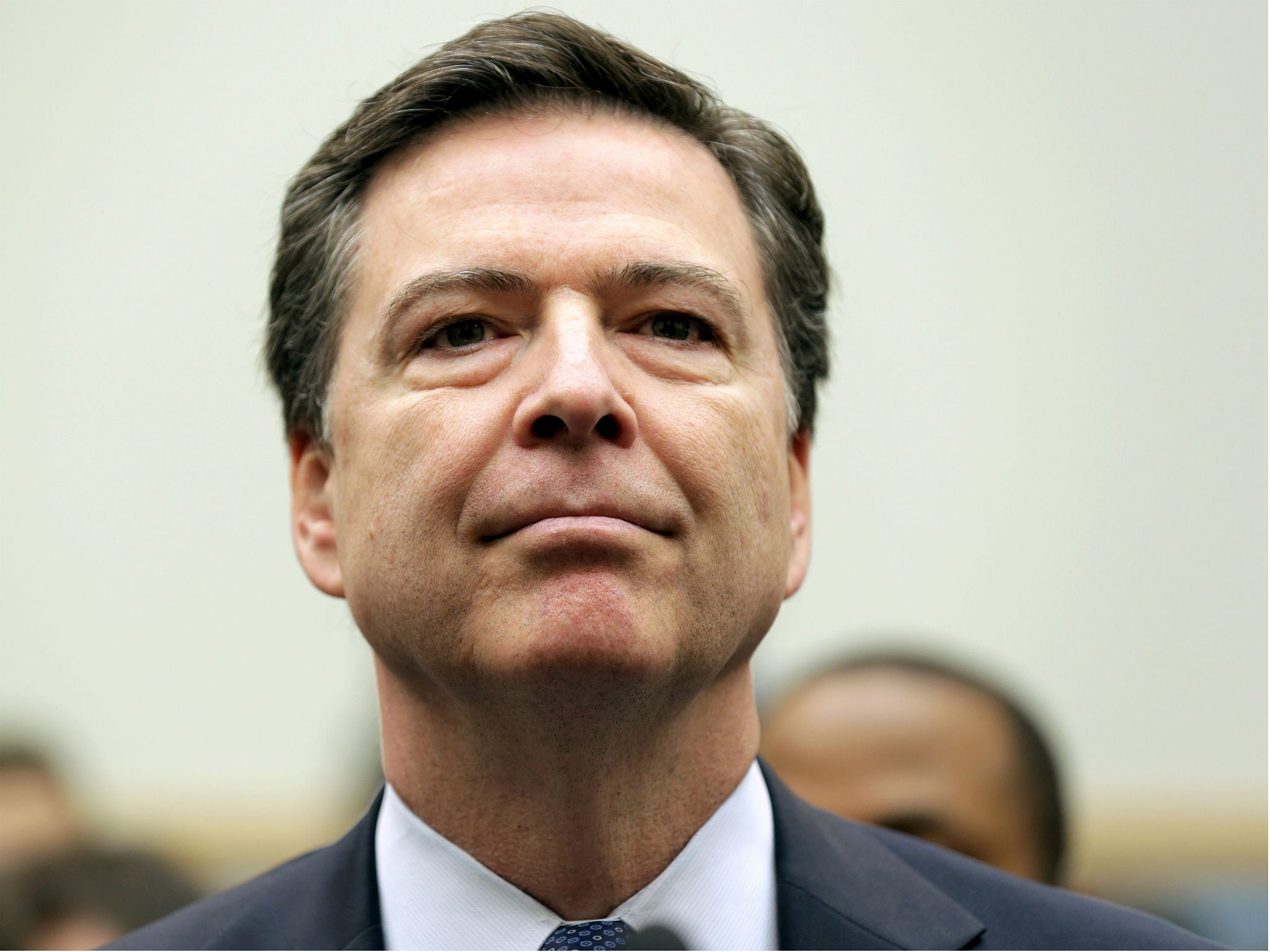 Former FBI director James Comey, seen here in Washington on March 1, 2016, was pushed out after Donald Trump urged him to let go a probe of Michael Flynn - who has now pleaded guilty