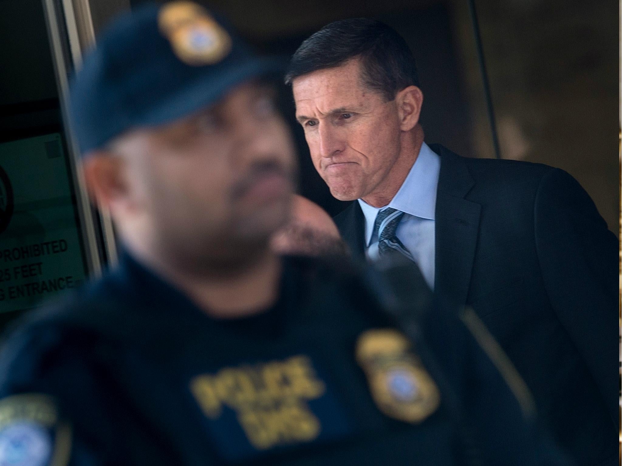 Michael Flynn resigned as national security adviser over his links to Russian officials – he is now co-operating with the FBI (Getty)