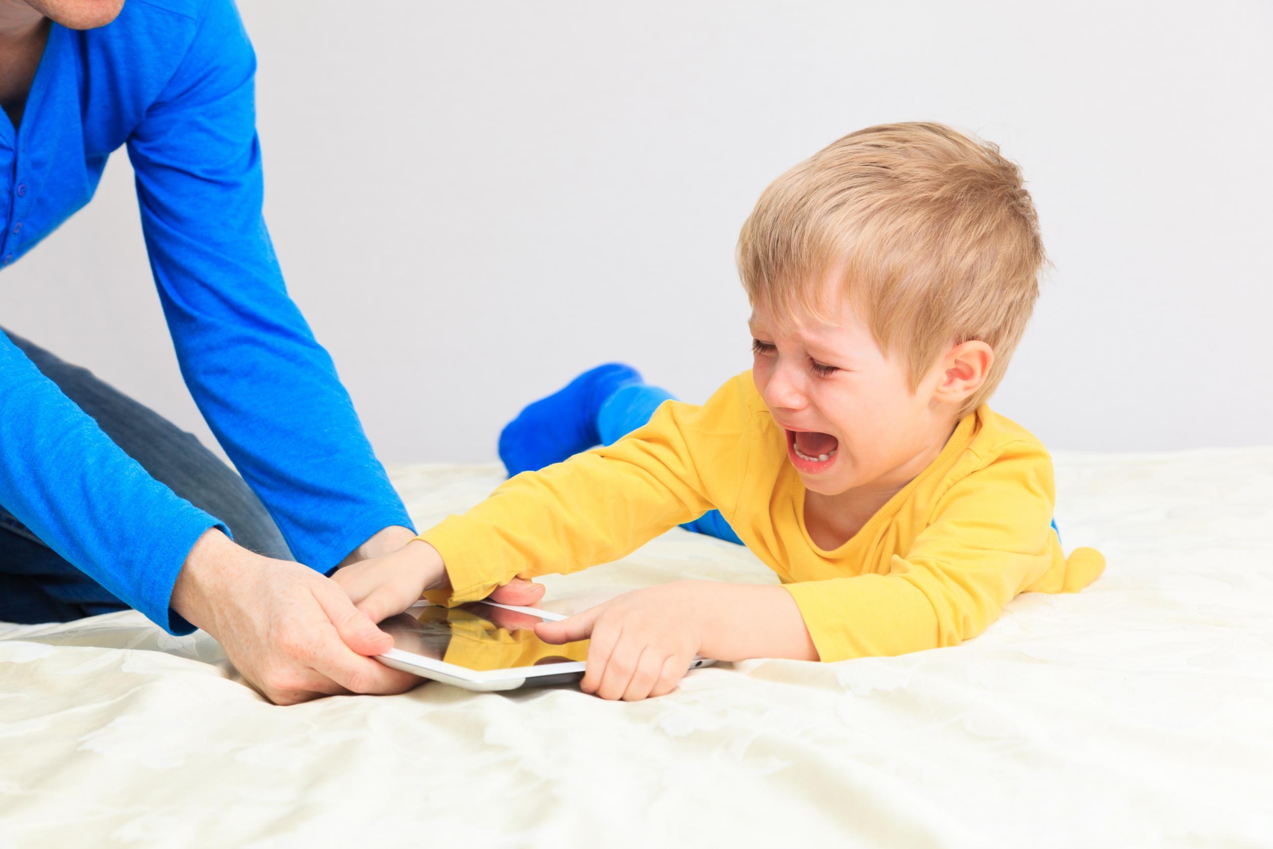 Tantrums when a tablet is removed can be cause for concern