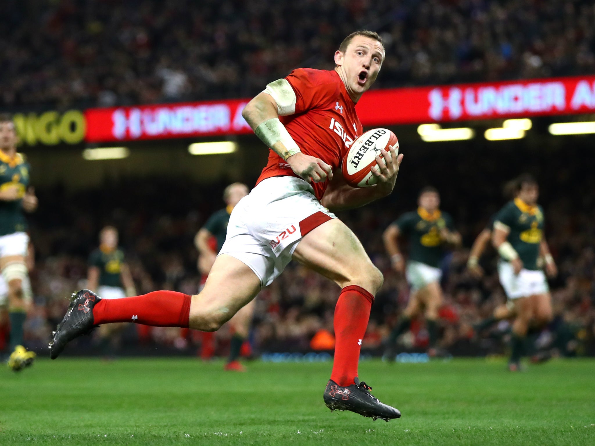 Hadleigh Parkes runs over to score his second try on debut