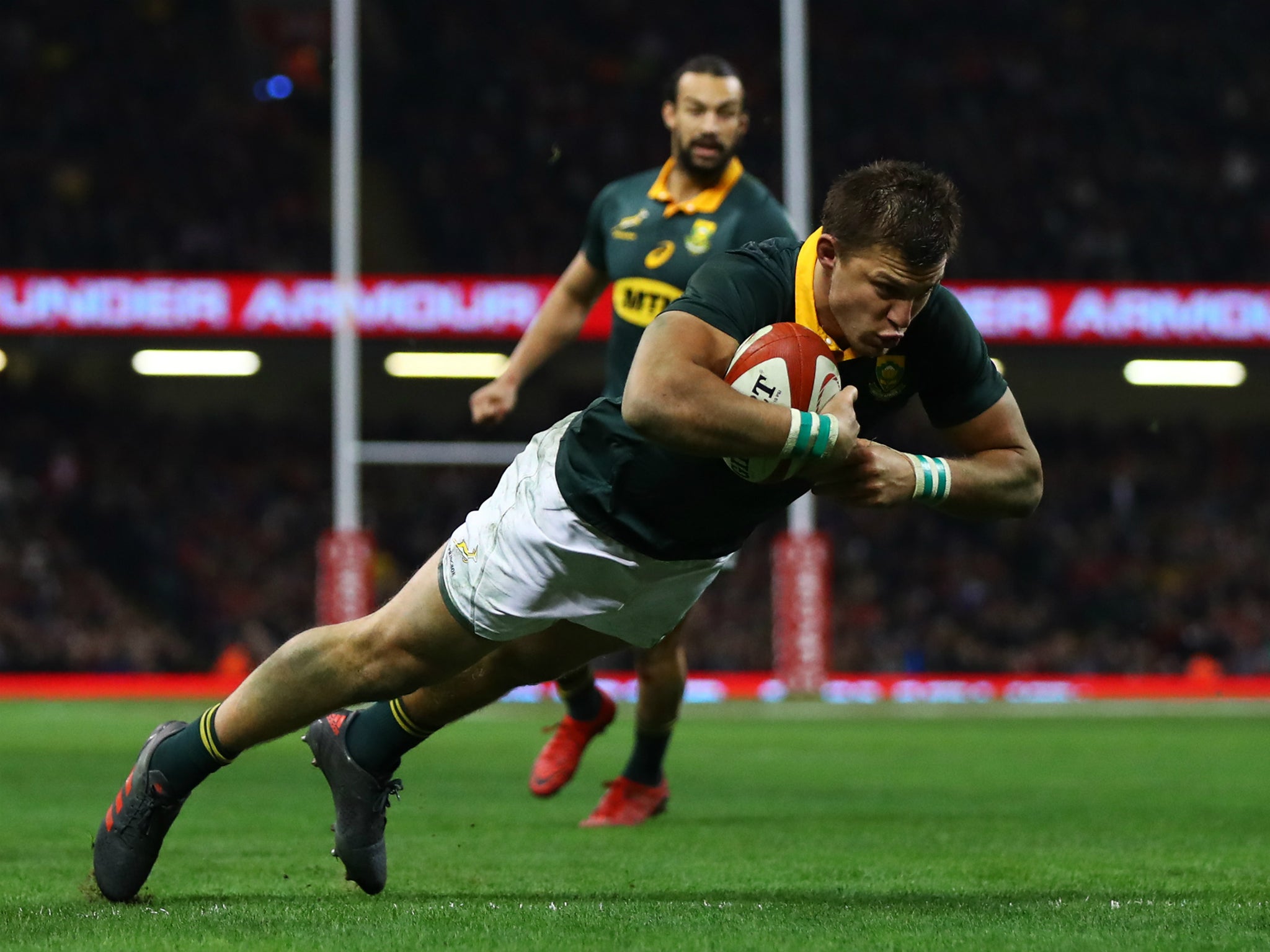 Handre Pollard dives over the line to score South Africa's second try