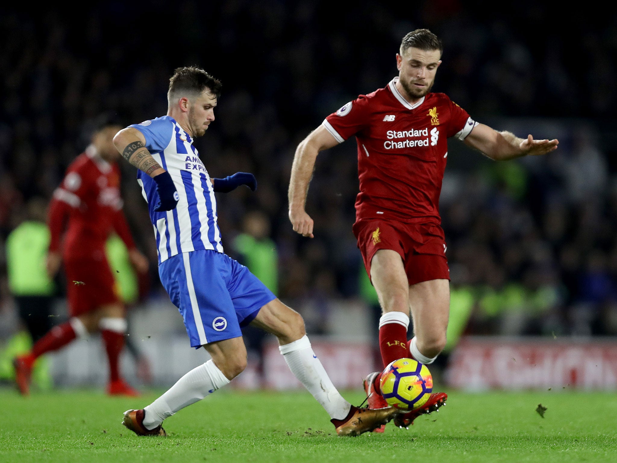 Henderson in action for Liverpool against Brighton