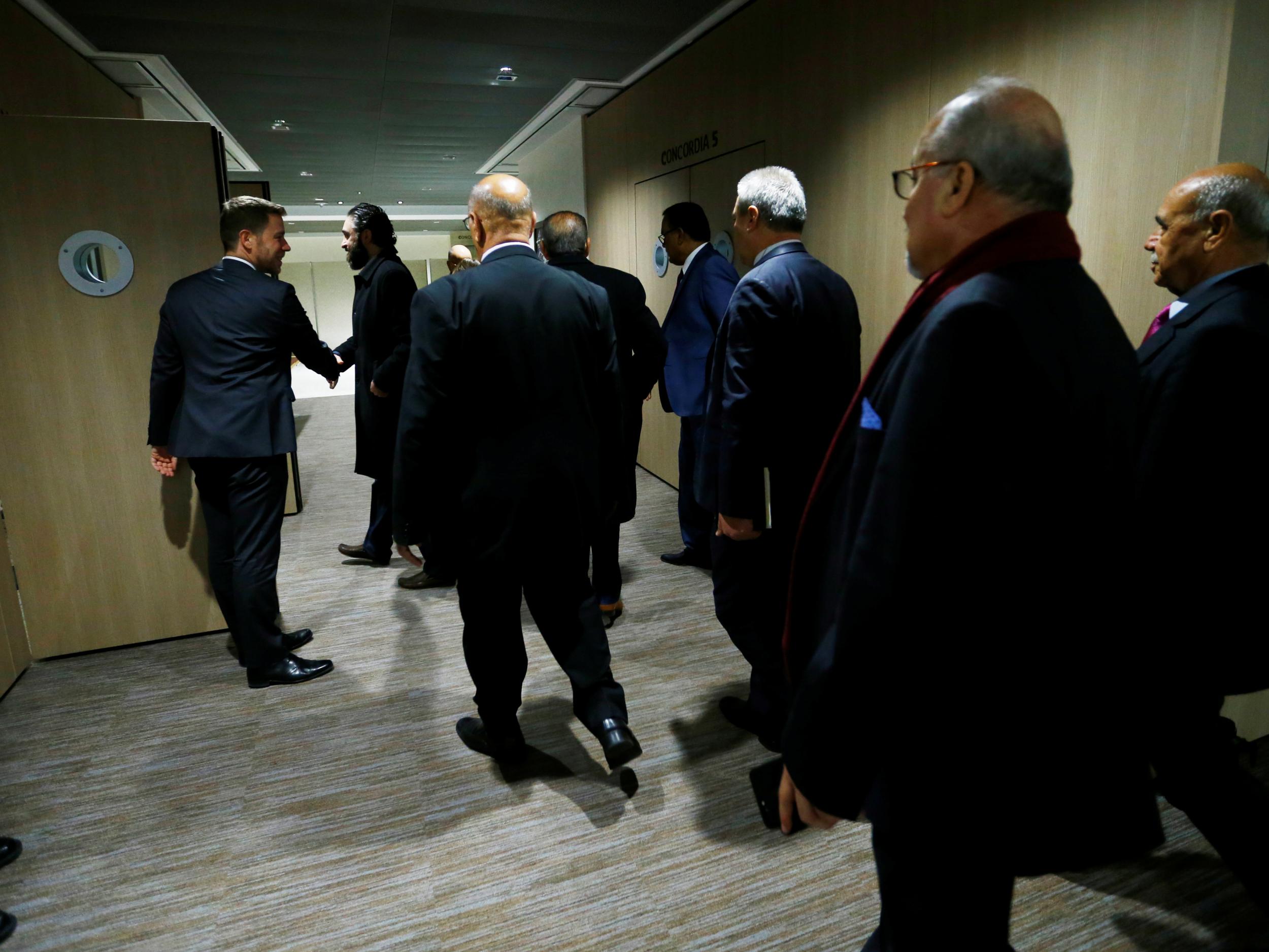 Members of the delegation of the Syrian Negotiation Commission (SNC) arrive for a meeting during the Intra Syria talks in Geneva, Switzerland on 1 December, 2017