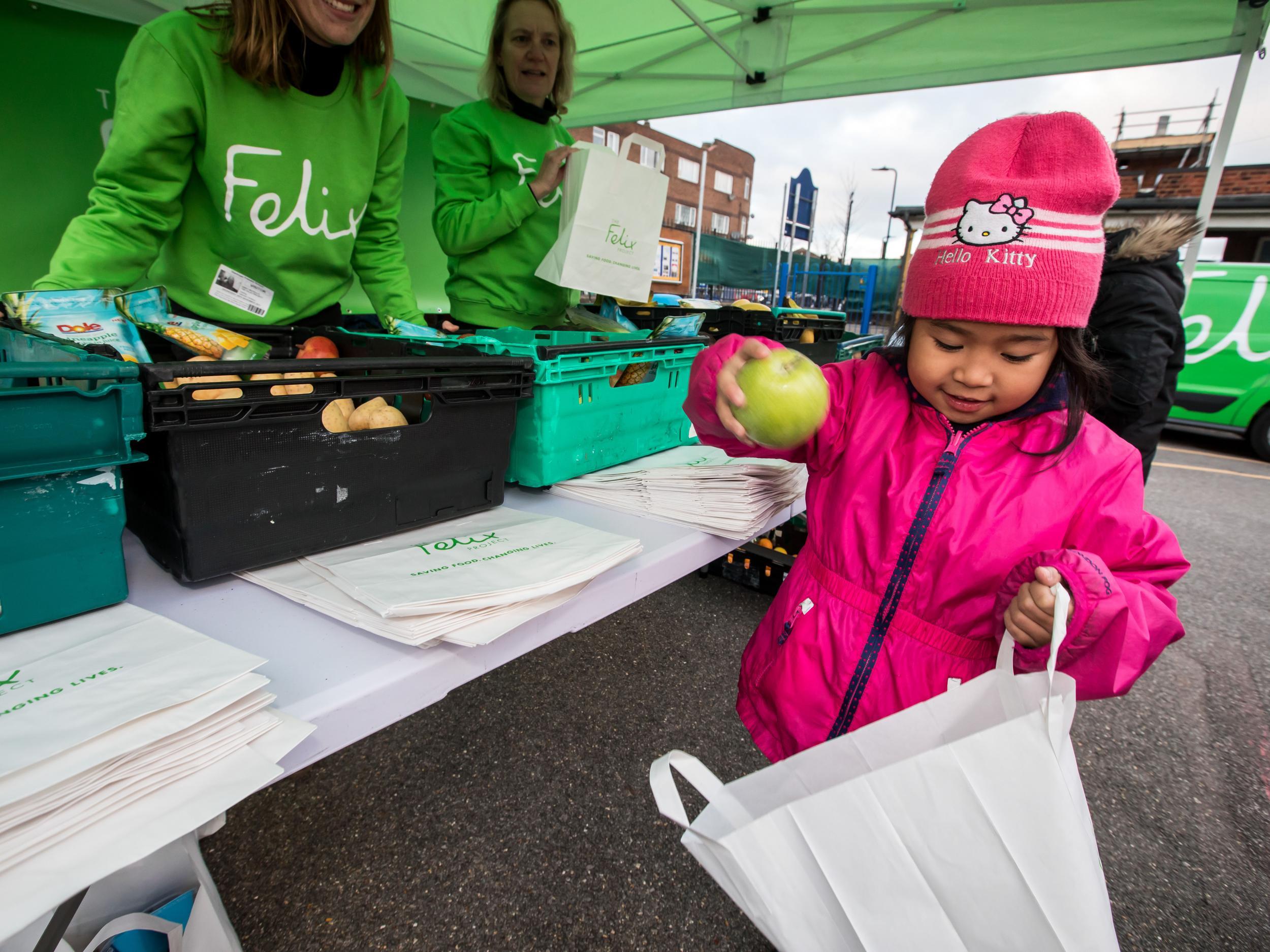 Children load up on fresh fruit and vegetables at Stanhope Primary school