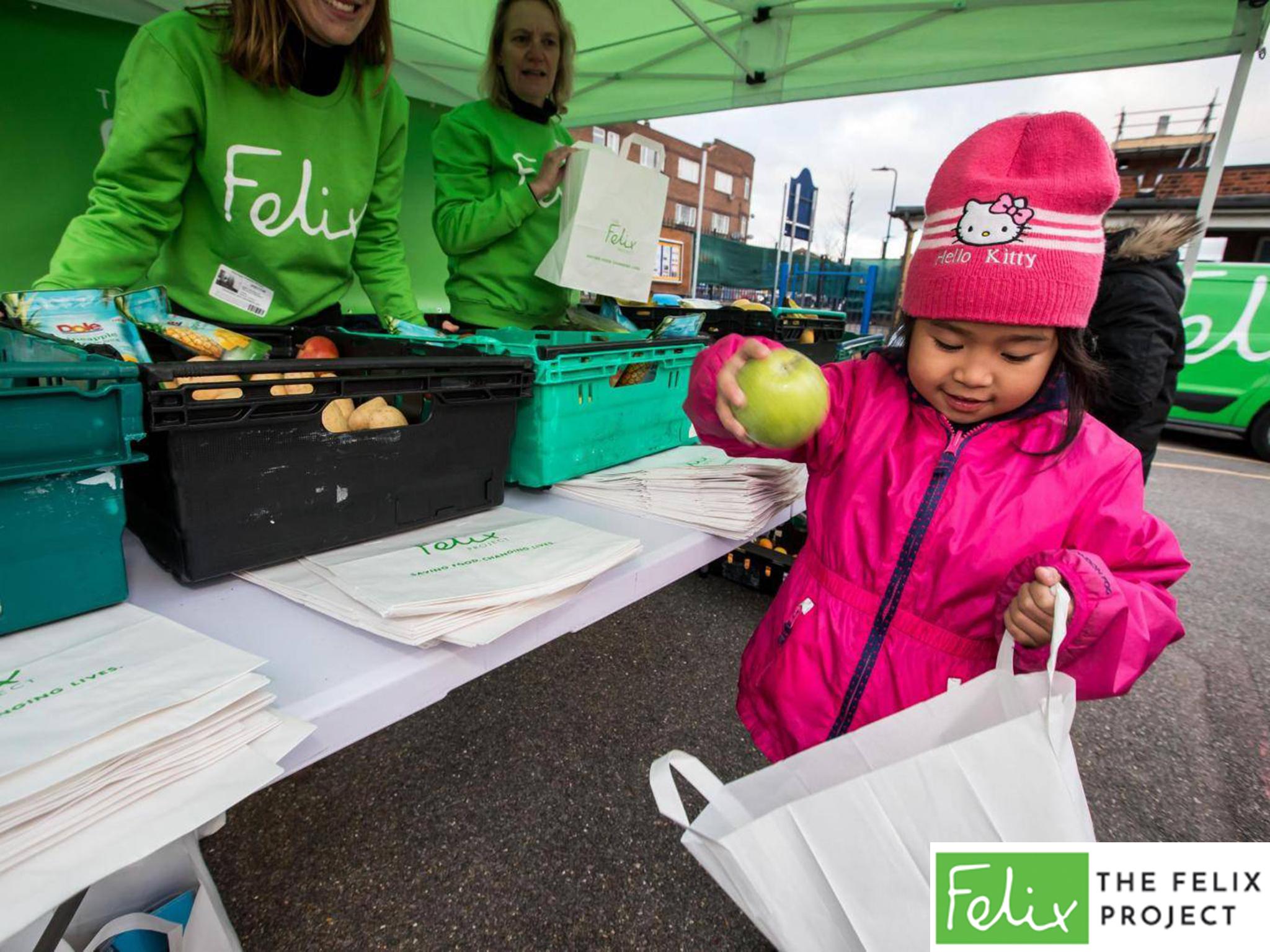 Children load up on fresh fruit and vegetables at Stanhope Primary school