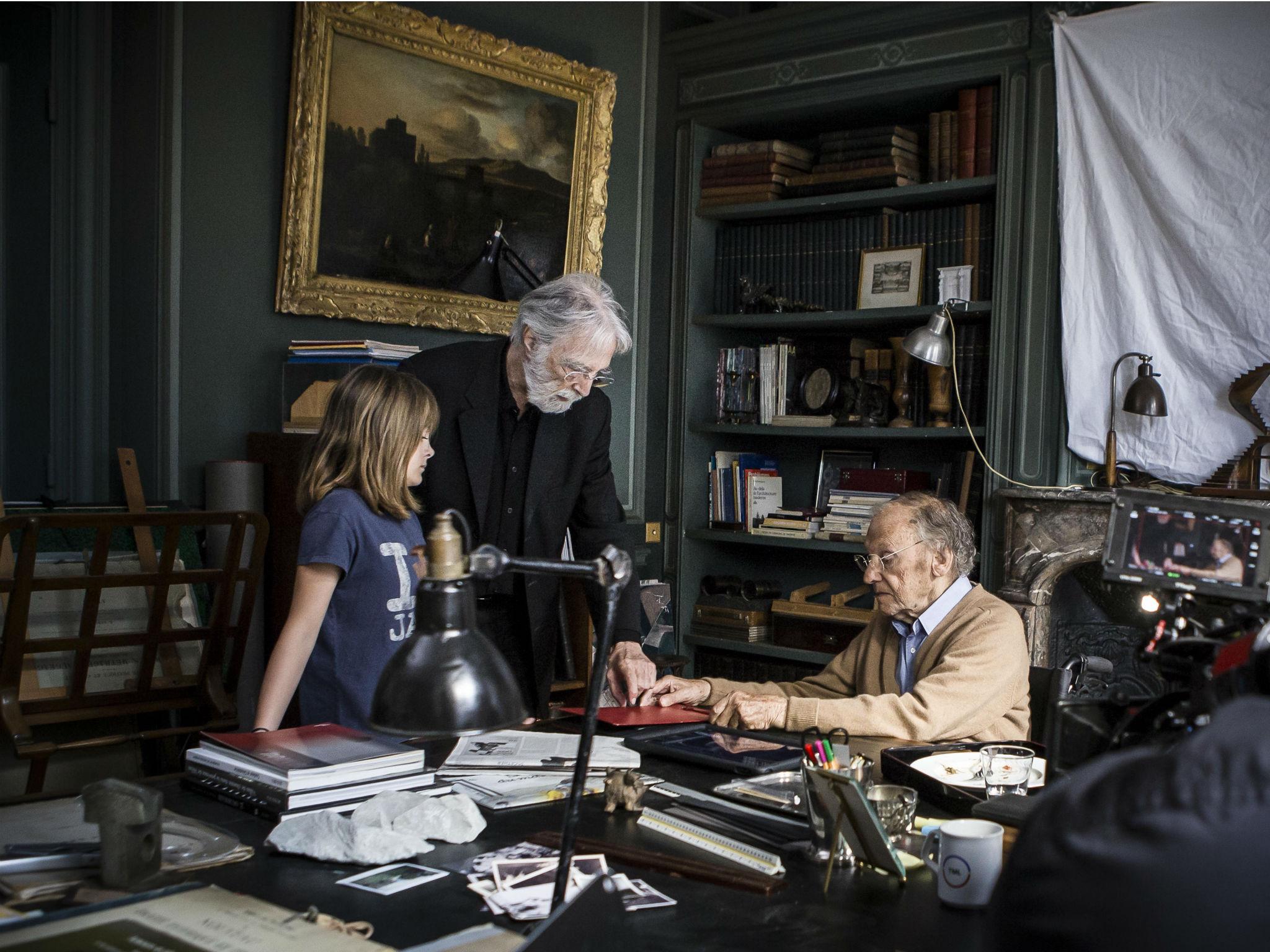 Haneke (centre) on set of his new film ‘Happy End’ with Jean-Louis Trintignant as Georges Laurent who has a beautifully intimate conversation with his granddaughter Eve, played by Fantine Harduin