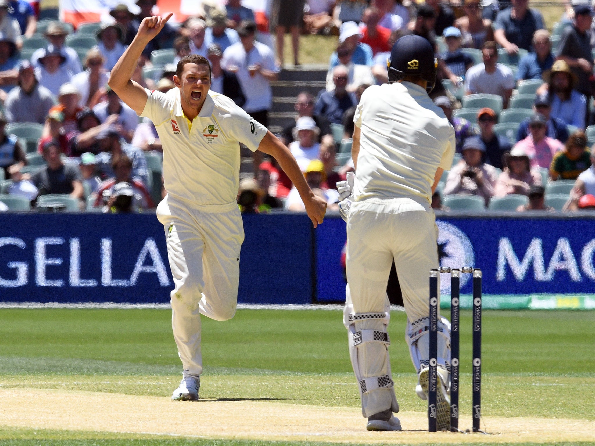 Josh Hazlewood takes the wicket of overnight watchman Chris Woakes