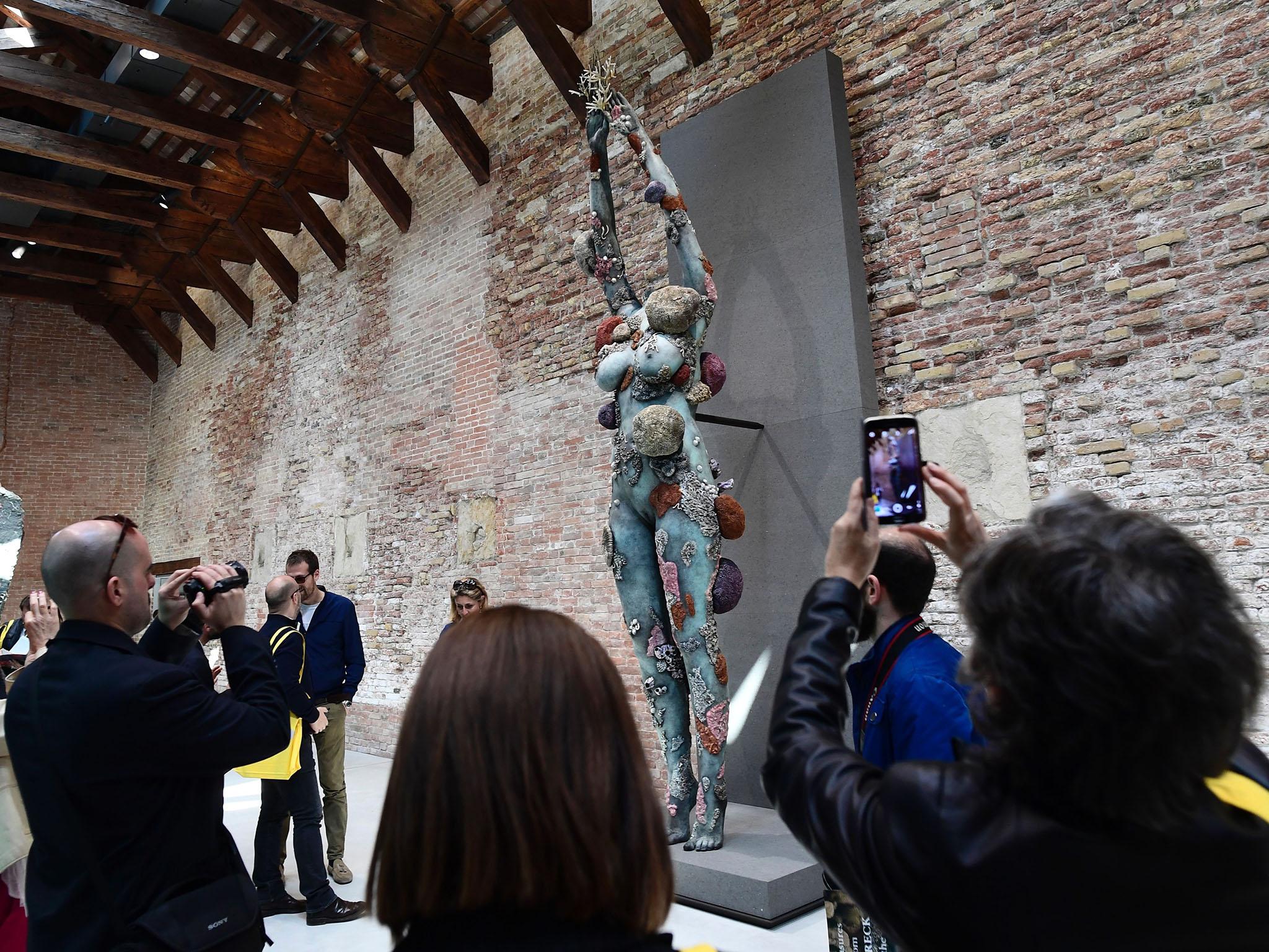 Damien Hirst’s ‘The Diver’ was among the works at his immense, long-awaited show in Venice