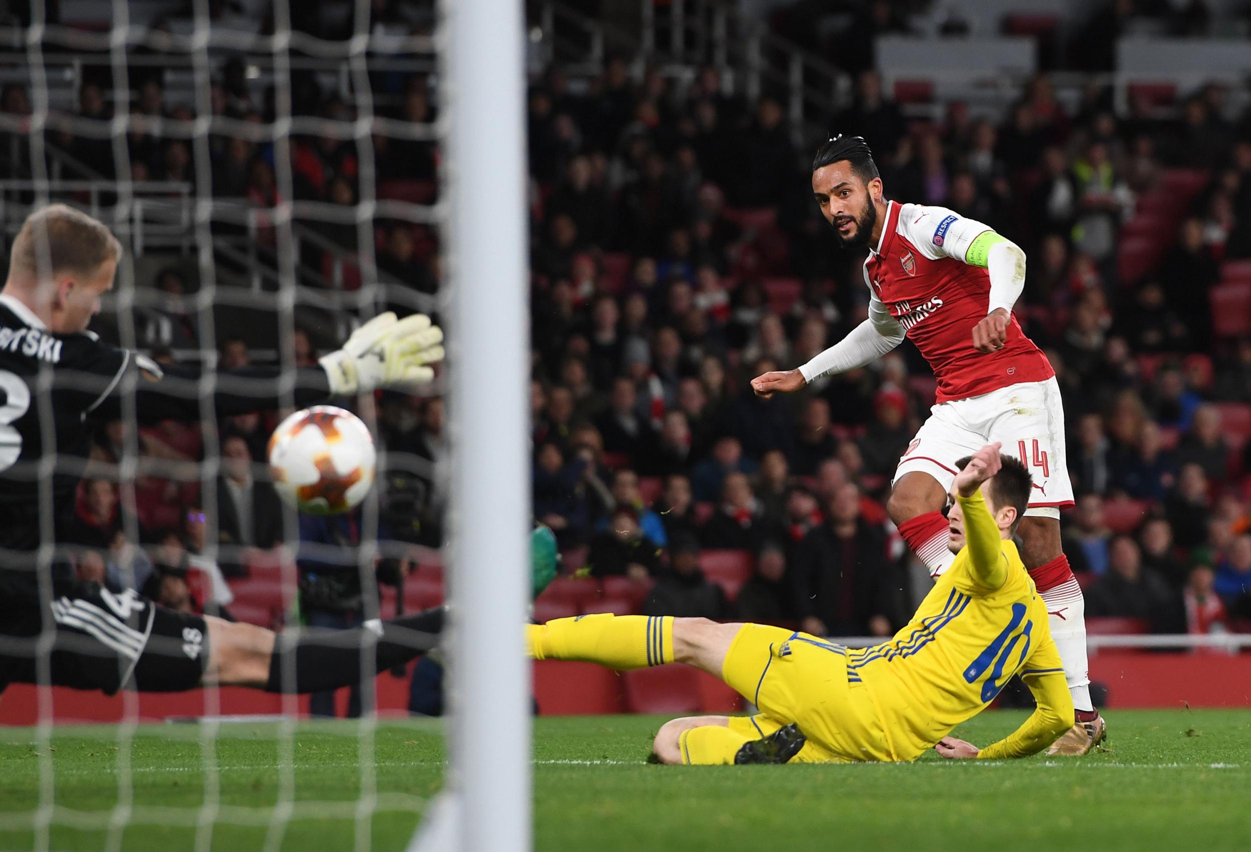 Theo Walcott slams in Arsenal's second of the night