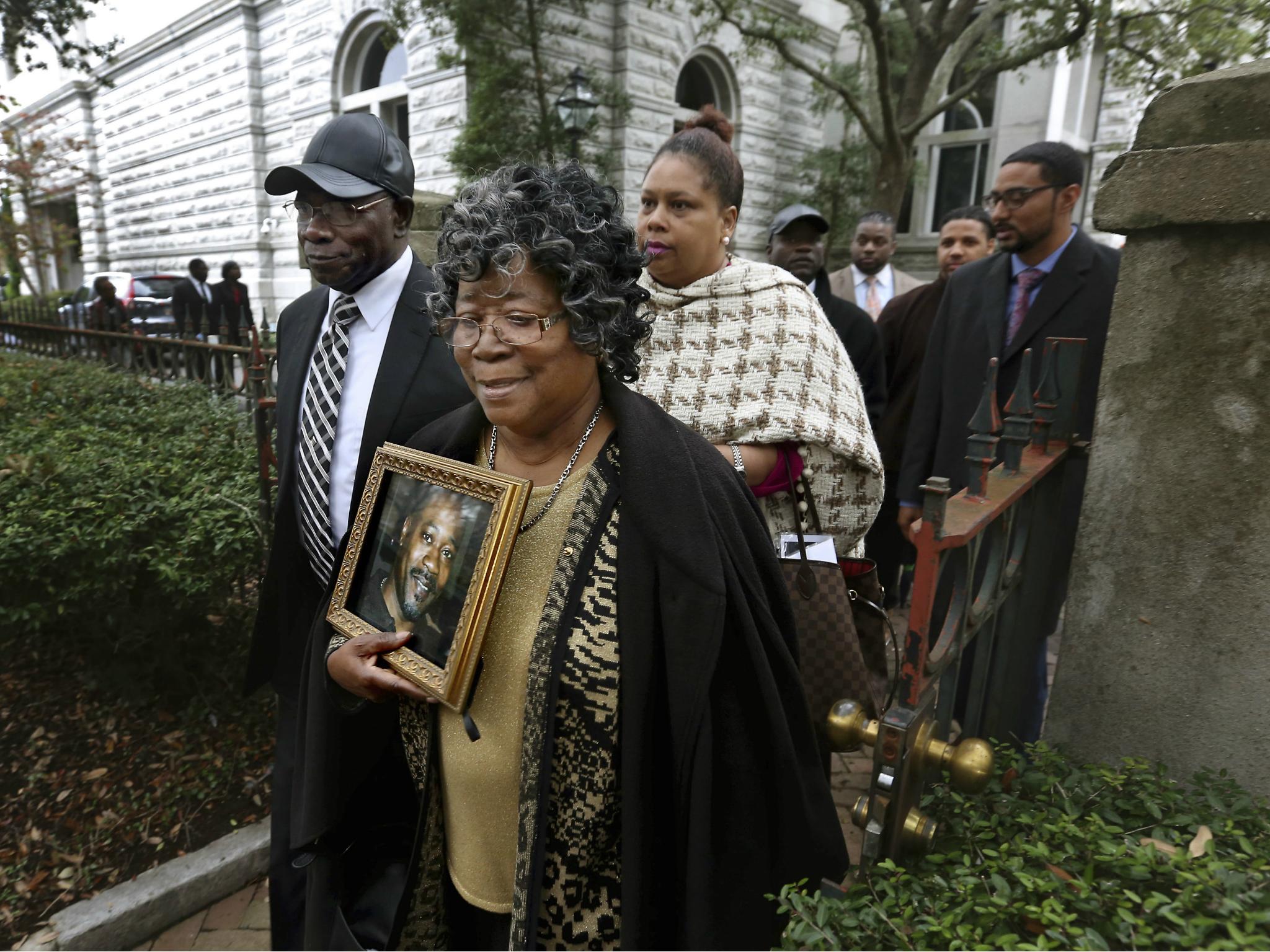 The parents of Walter Scott, Walter Scott Sr. and Judy Scott, leave the courthouse after former North Charleston police officer Michael Slager was sentenced to 20 years in prison for the 2015 shooting death of their son.