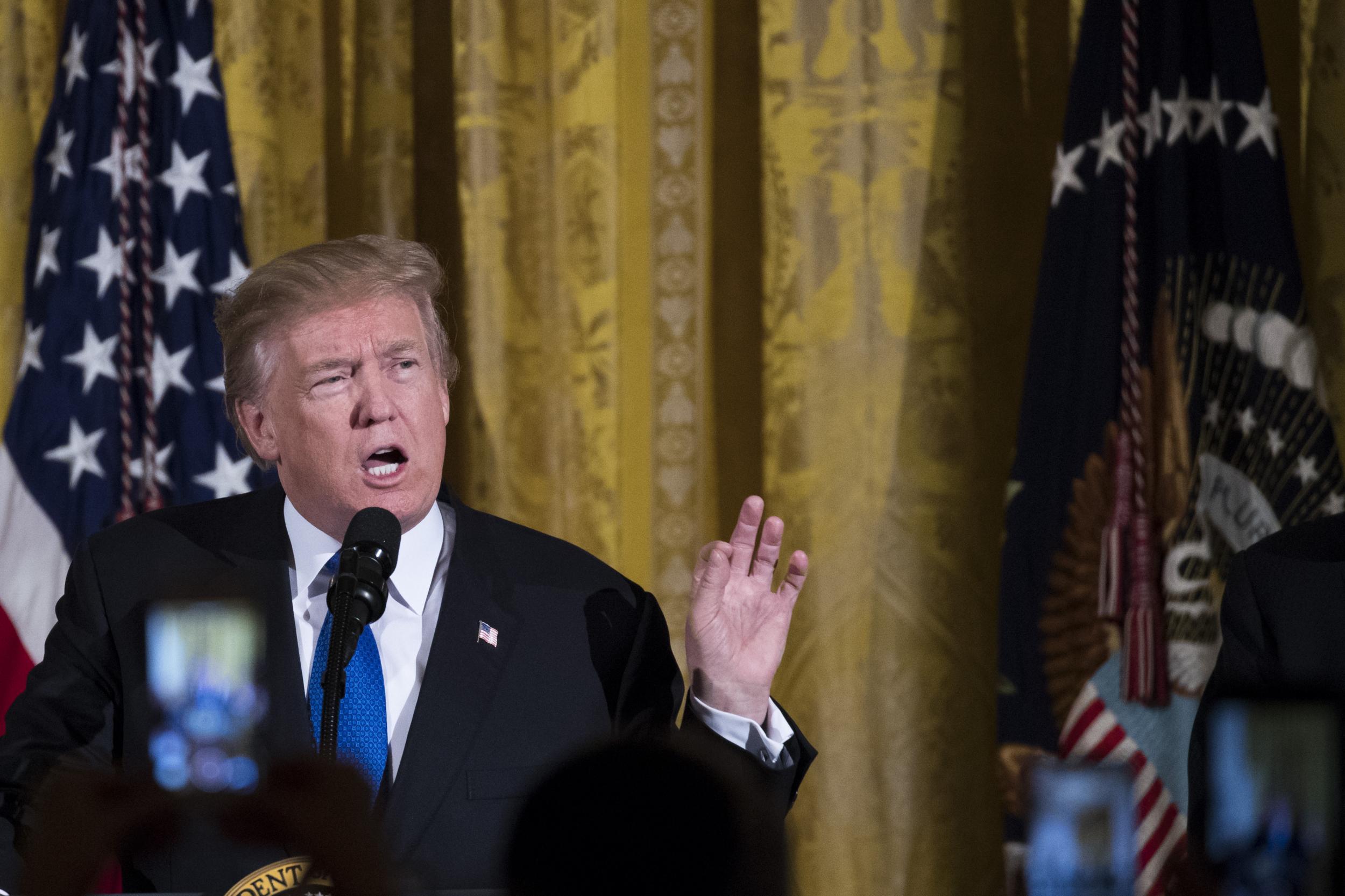 President Donald Trump speaks during a Hanukkah Reception in the East Room of the White House