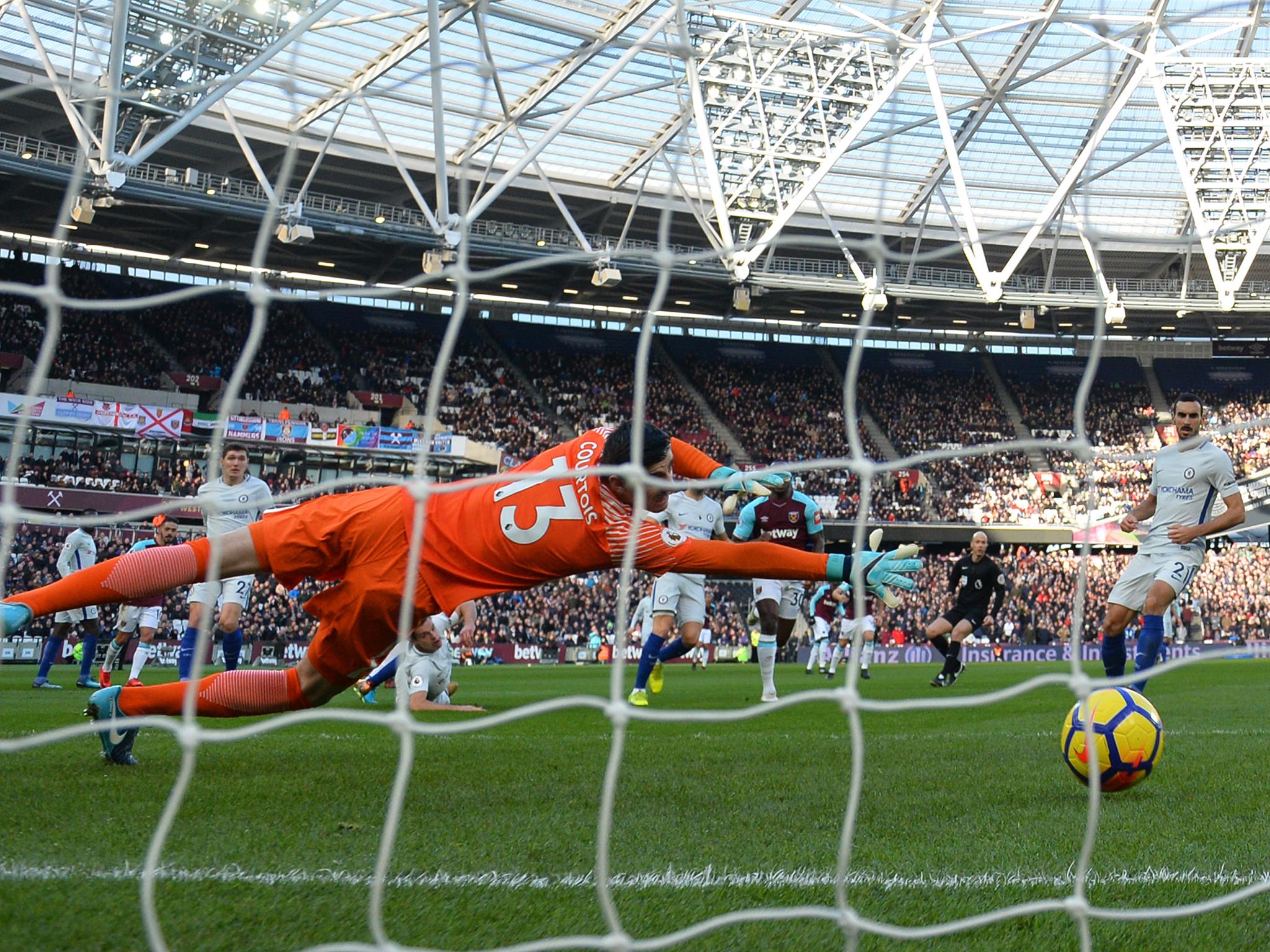 Courtois is beaten at his far post by Arnautovic