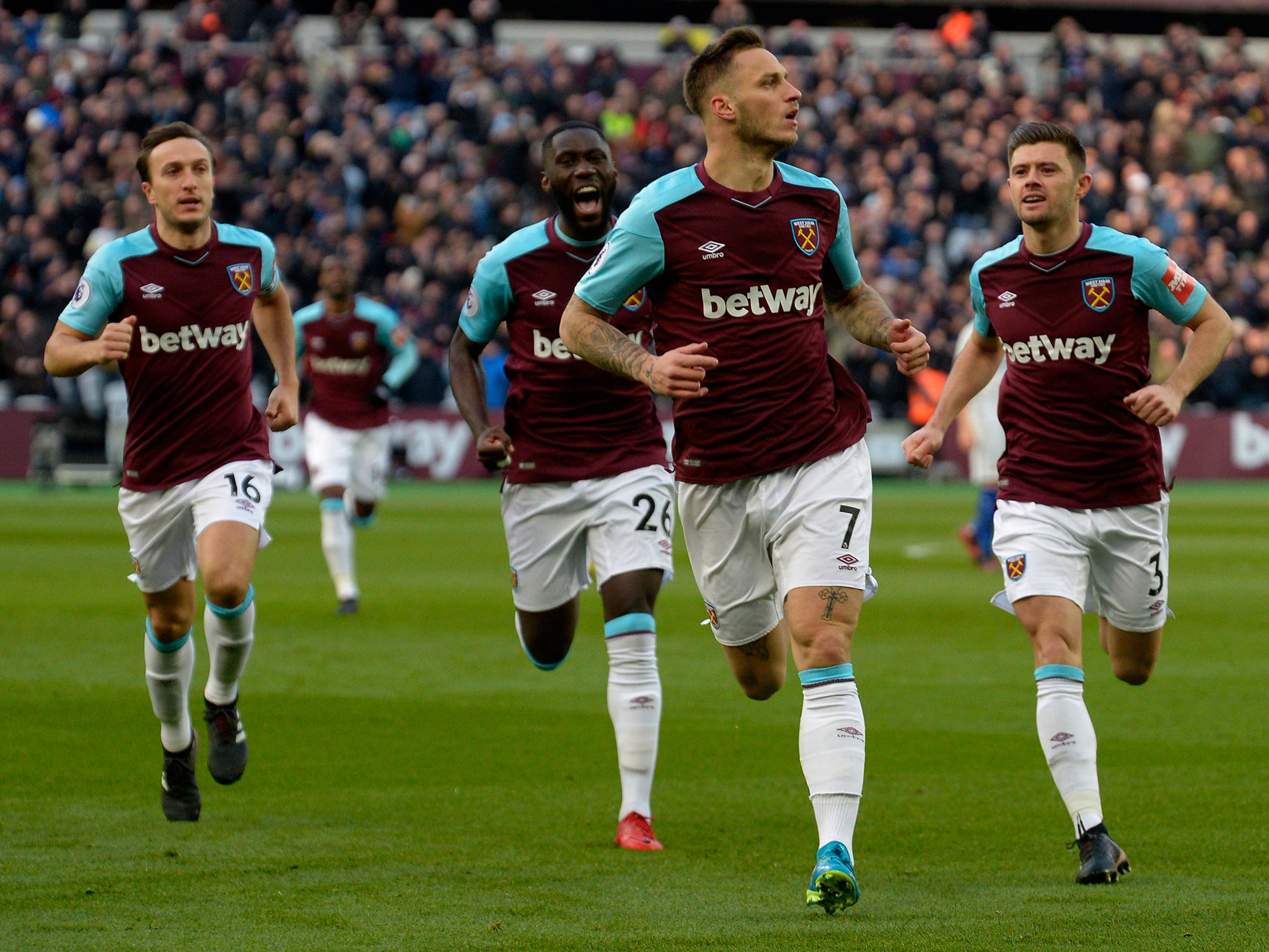 Marko Arnautovic celebrates after scoring his winning goal against Chelsea