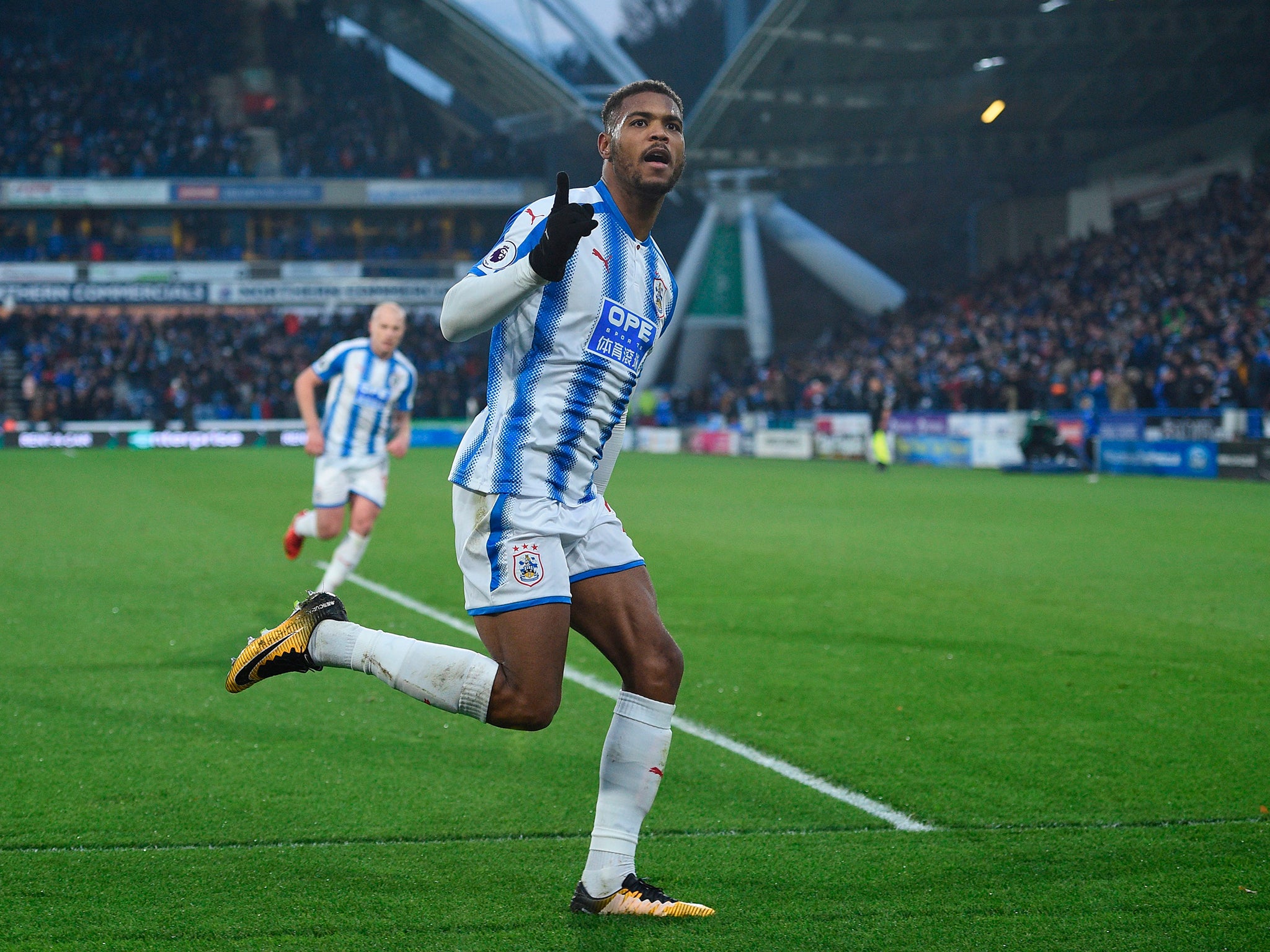 Steve Mounie celebrates after putting Huddersfield ahead of Brighton