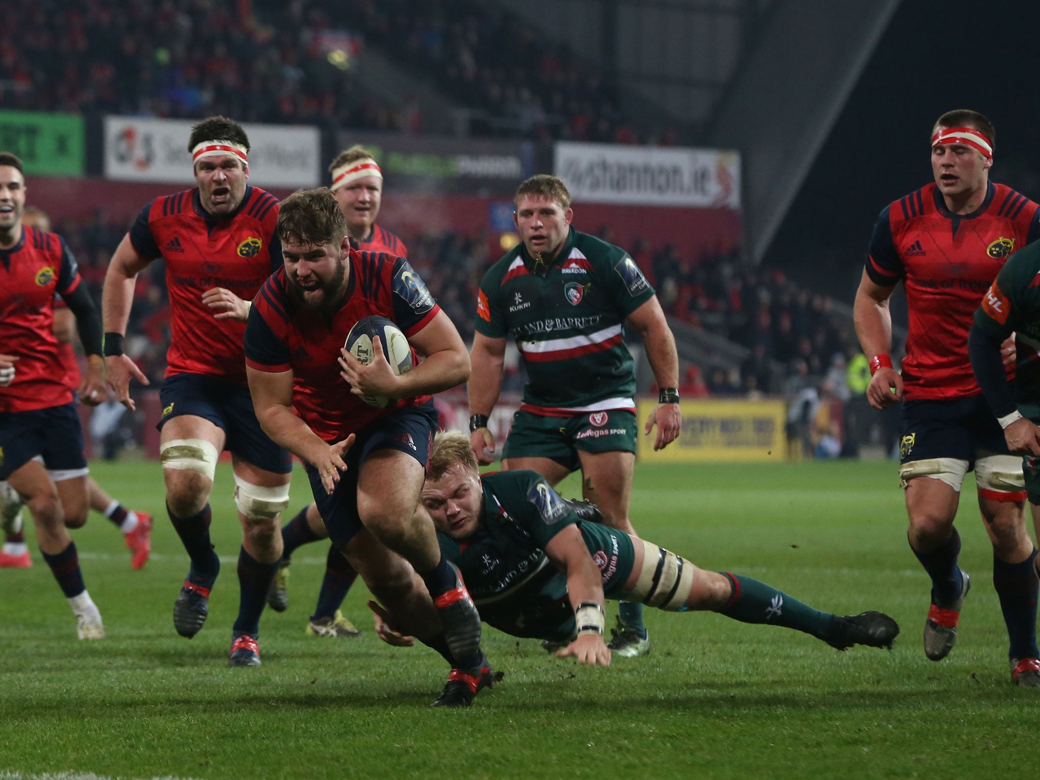 Rhys Marshall breaks free of a tackle to score for the hosts