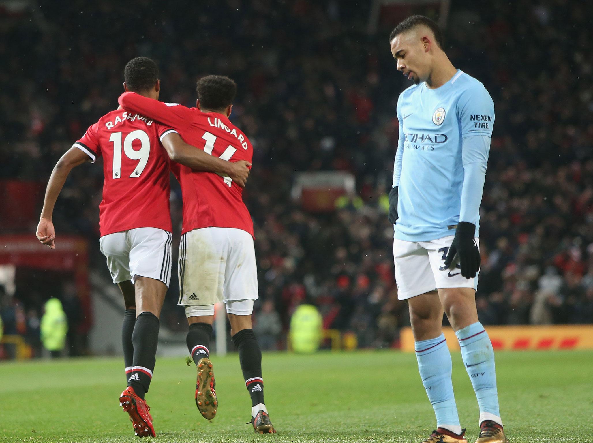 Marcus Rashford and Jesse Lingard celebrate the equaliser (Getty)