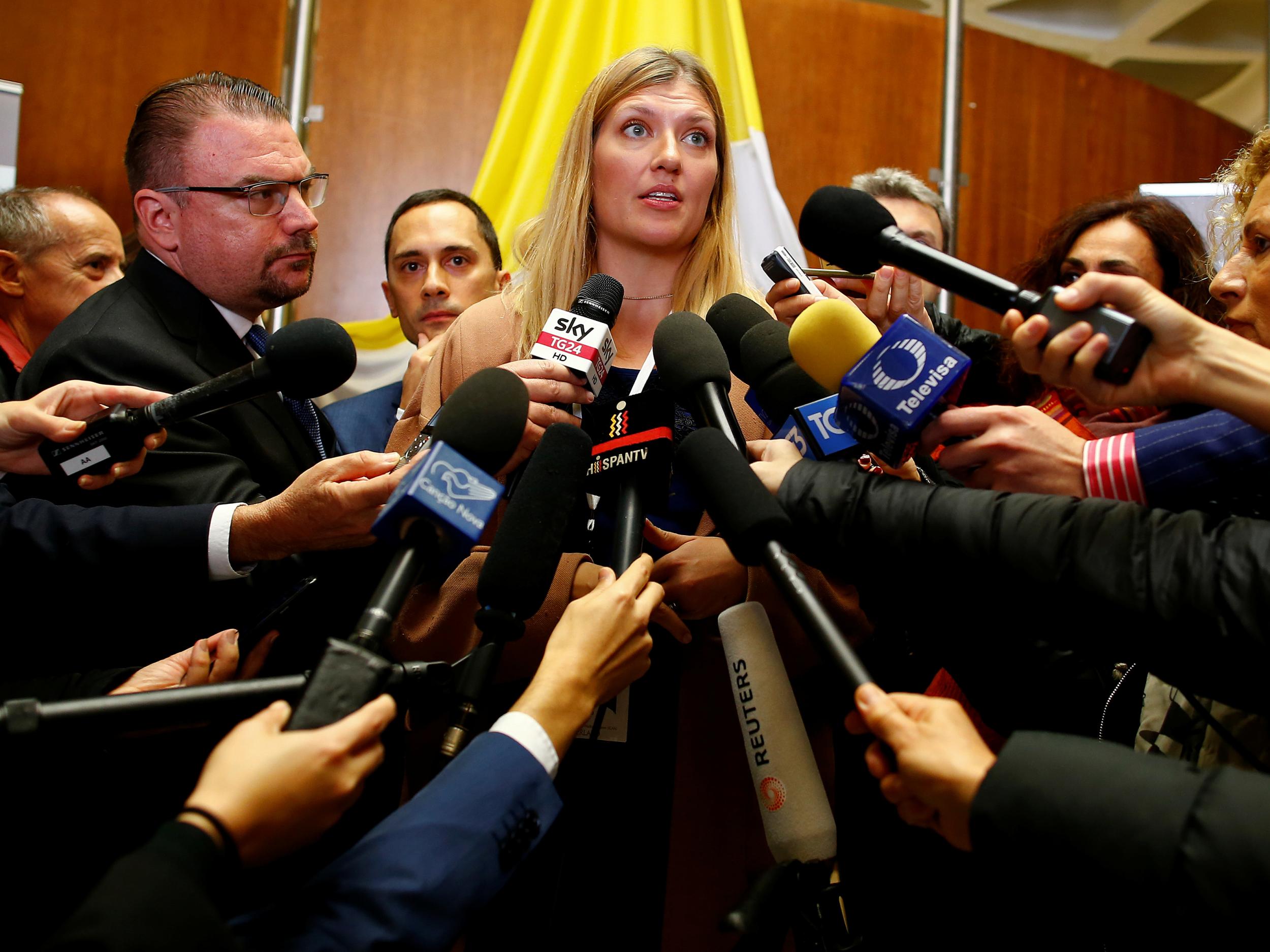 Beatrice Fihn, Executive Director of the International Campaign to Abolish Nuclear Weapons (ICAN), who was awarded the 2017 Nobel Peace Prize, talks with reporters