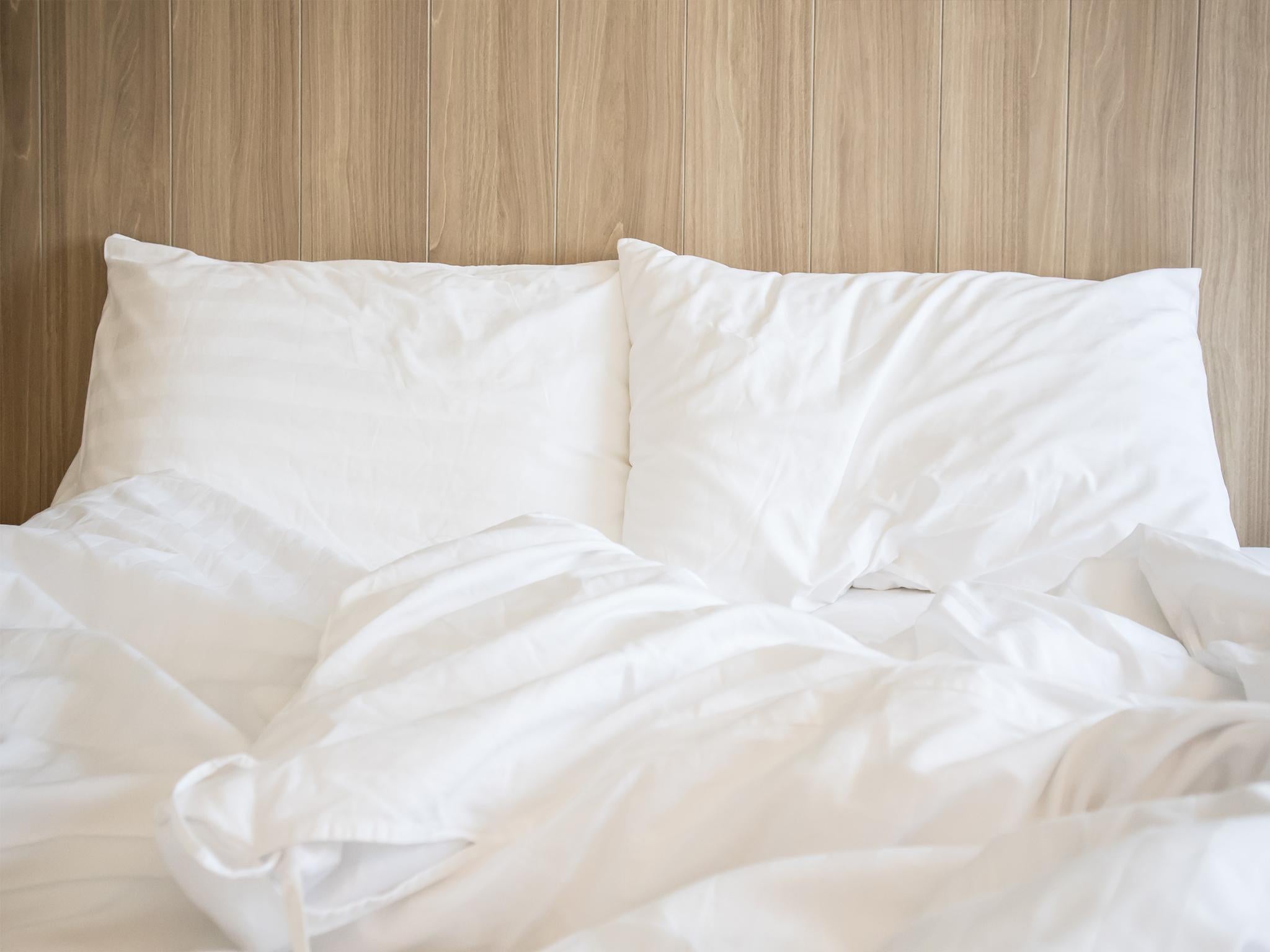 Dirty bed sheets have been linked to increased acne Shutterstock