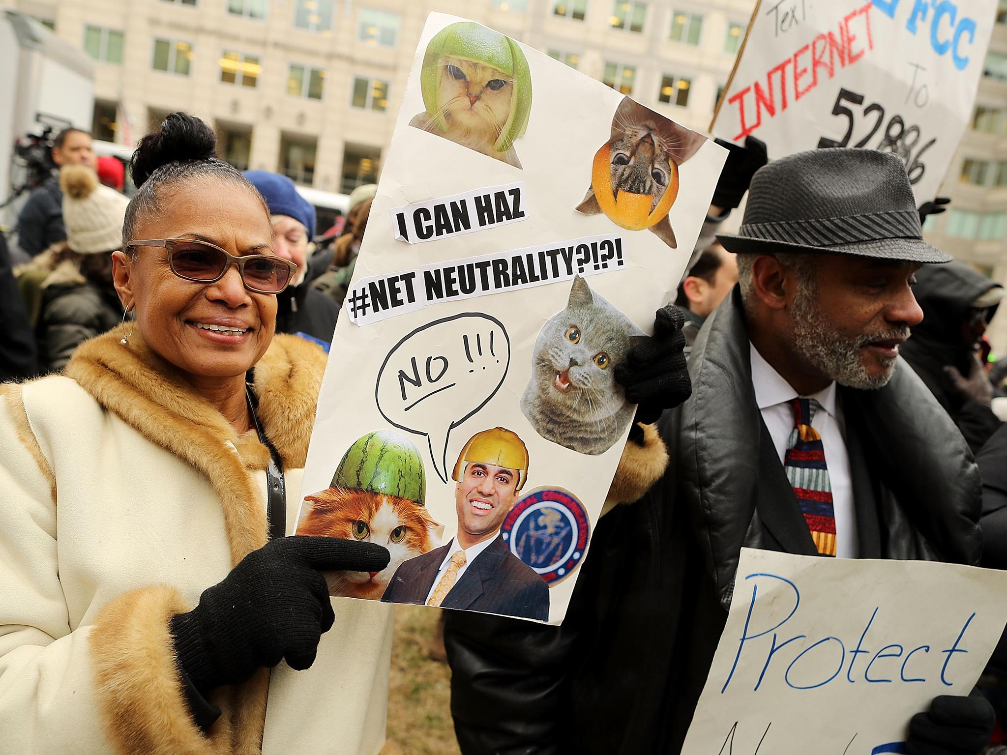Demonstrators rally outside the Federal Communication Commission building to protest against the end of net nutrality rules December 14, 2017 in Washington, DC. Lead by FCC Chairman Ajit Pai, the commission is expected to do away with Obama Administration rules that prevented internet service providers from creating differnt levels of service and blocking or promoting individual companies and organizations on their systems.