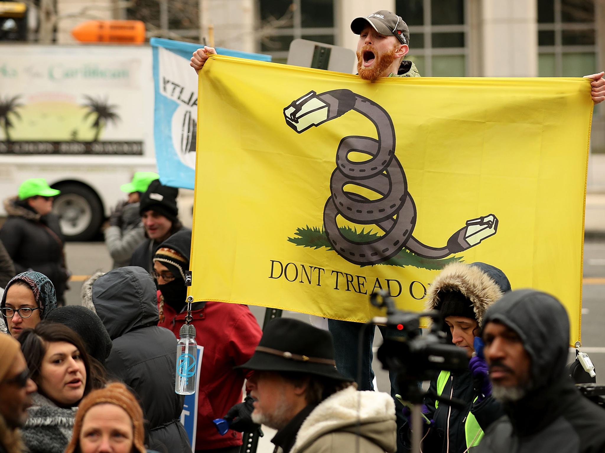 Demonstrators rally outside the Federal Communication Commission building to protest against the end of net nutrality rules December 14, 2017 in Washington, DC. Lead by FCC Chairman Ajit Pai, the commission is expected to do away with Obama Administration rules that prevented internet service providers from creating differnt levels of service and blocking or promoting individual companies and organizations on their systems.