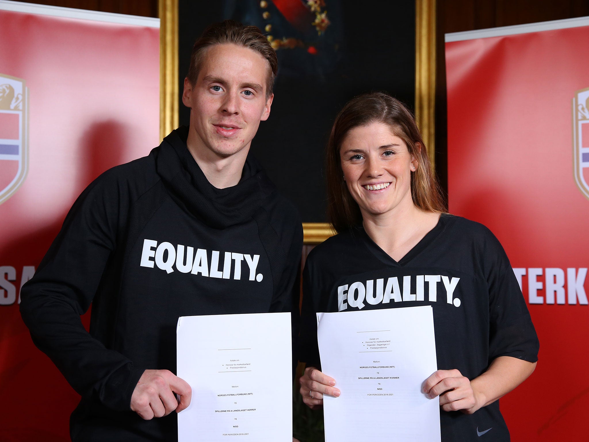 Johansen and Mjelde together after signing the agreement