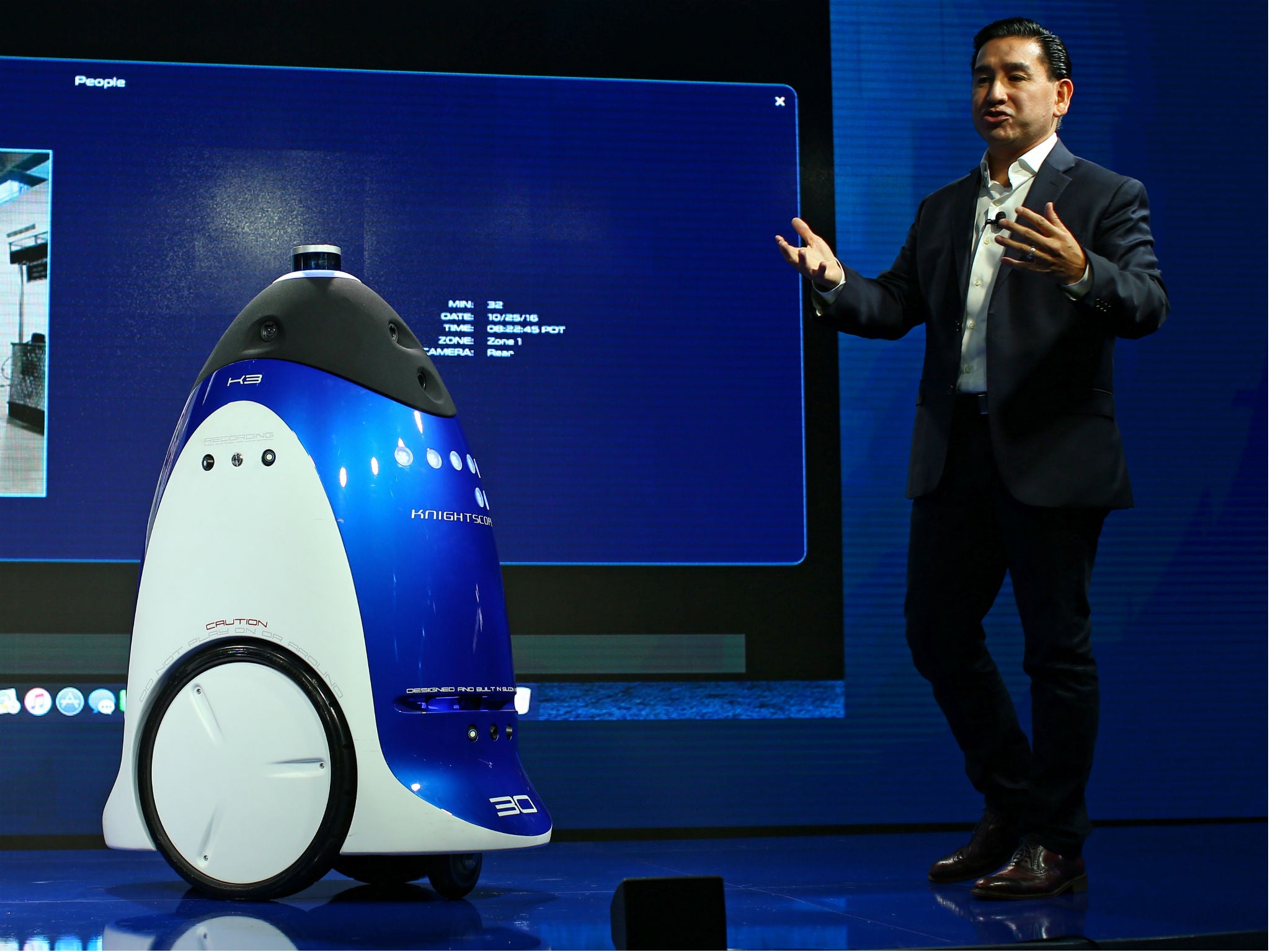 Knightscope Inc. CEO William Santana Li demos a security robot like the one deployed by the SPCA at a conference in Laguna Beach, California