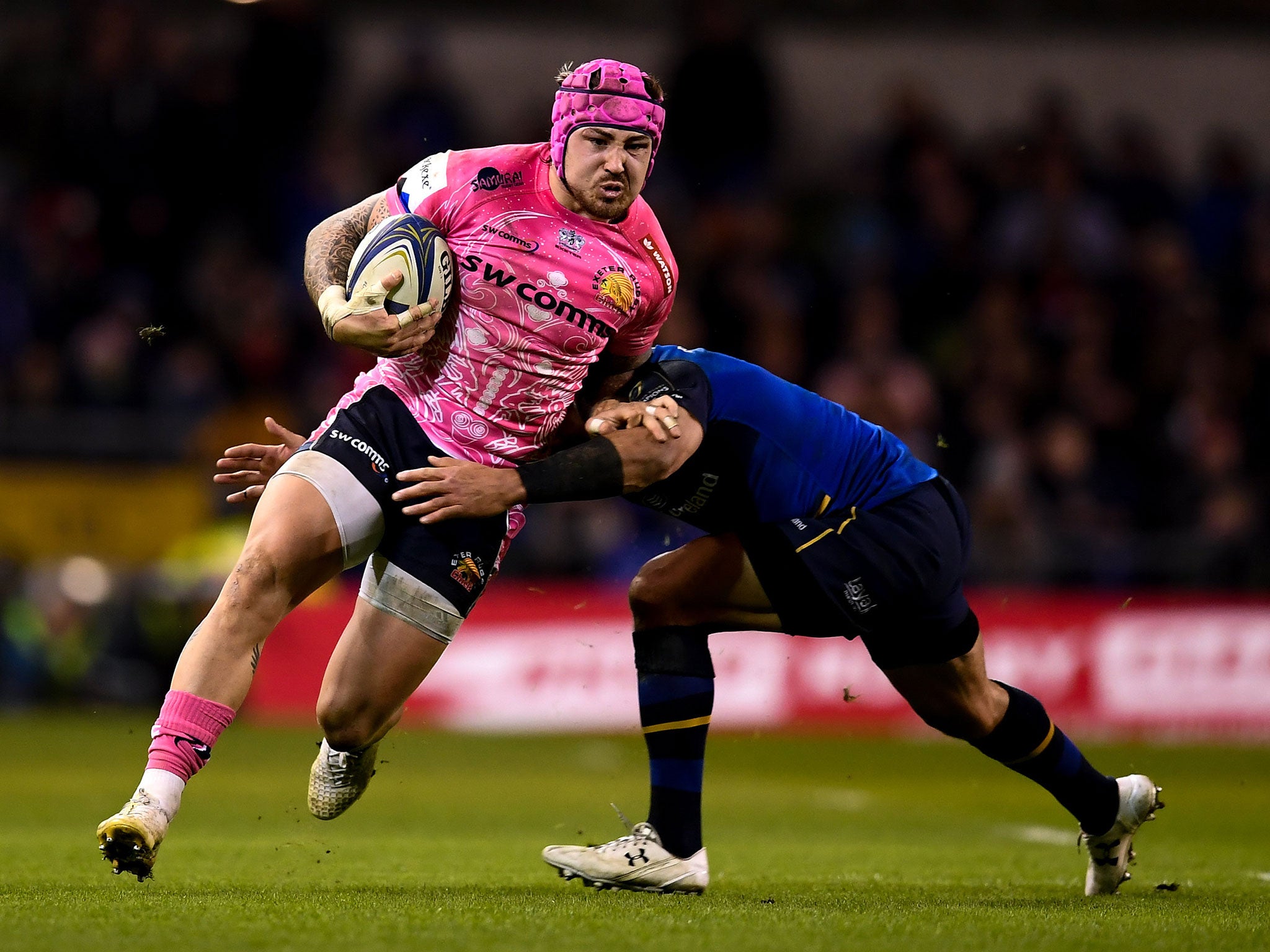 Jack Nowell tries to break free of a tackle