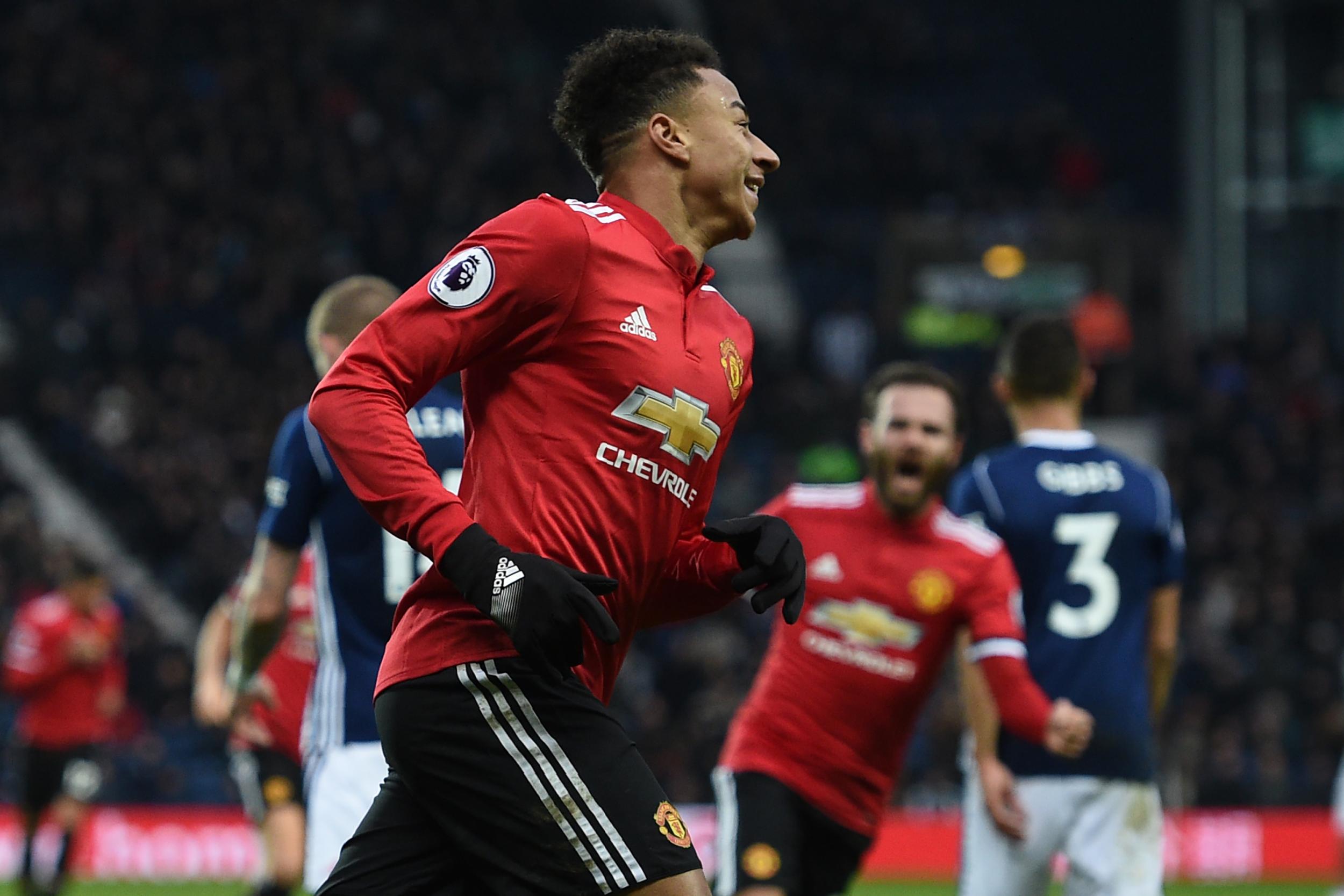 Lingard celebrates scoring against West Brom