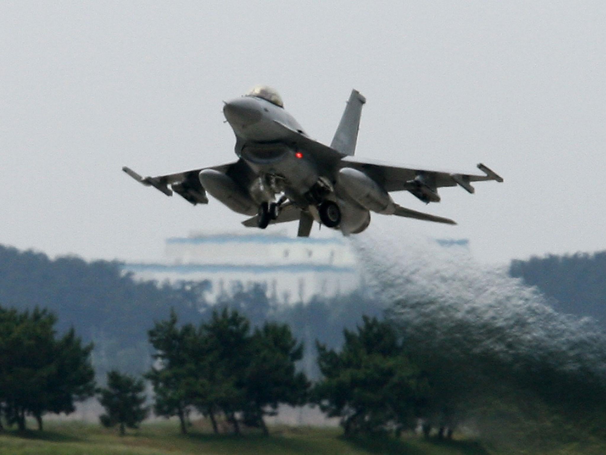 An F-16 takes off during a South Korea and US Air Force combined training exercise in Kunsan, South Korea